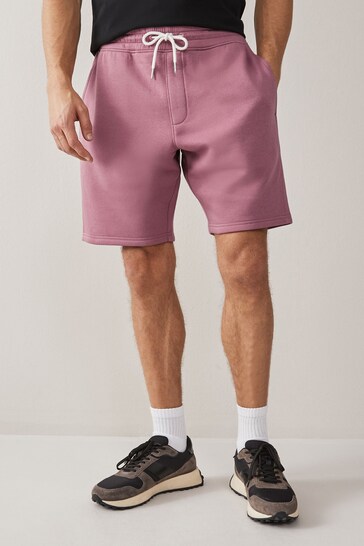 high-rise raw-edge denim shorts