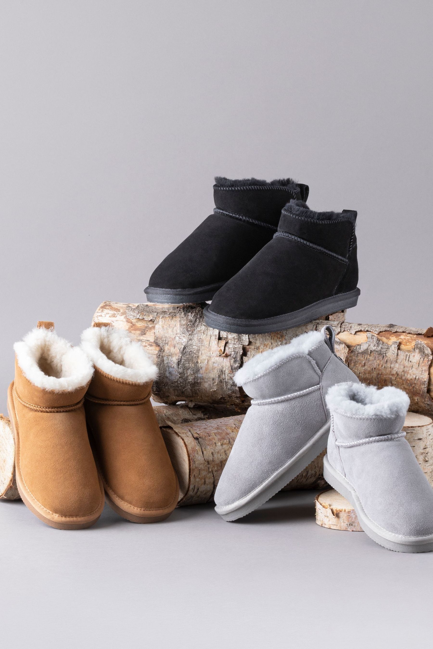 Buy Lakeland Leather Black Ladies Sheepskin Mini Boot Slippers from the Next UK online shop