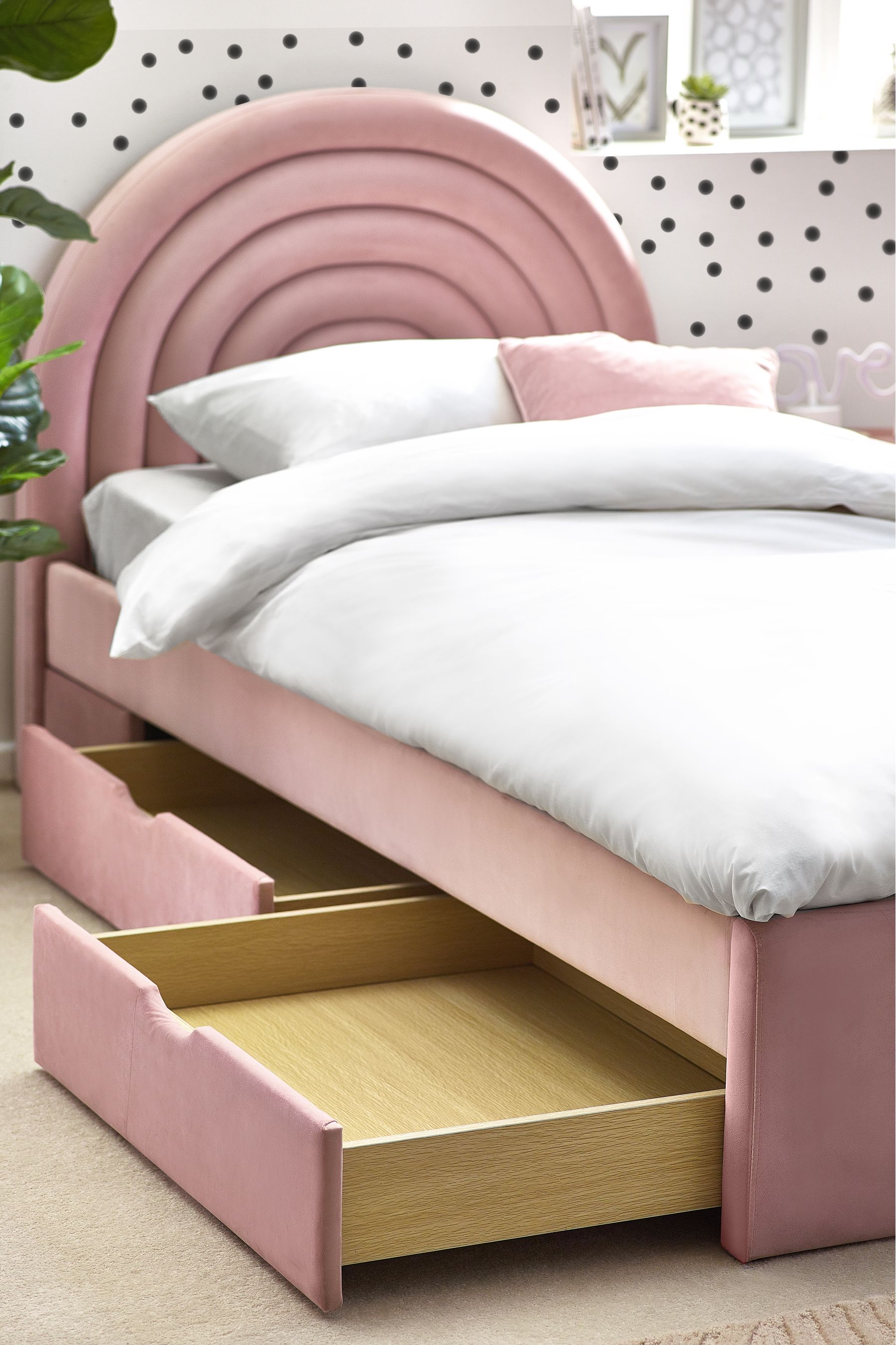 Pink upholstered new arrivals bed with storage