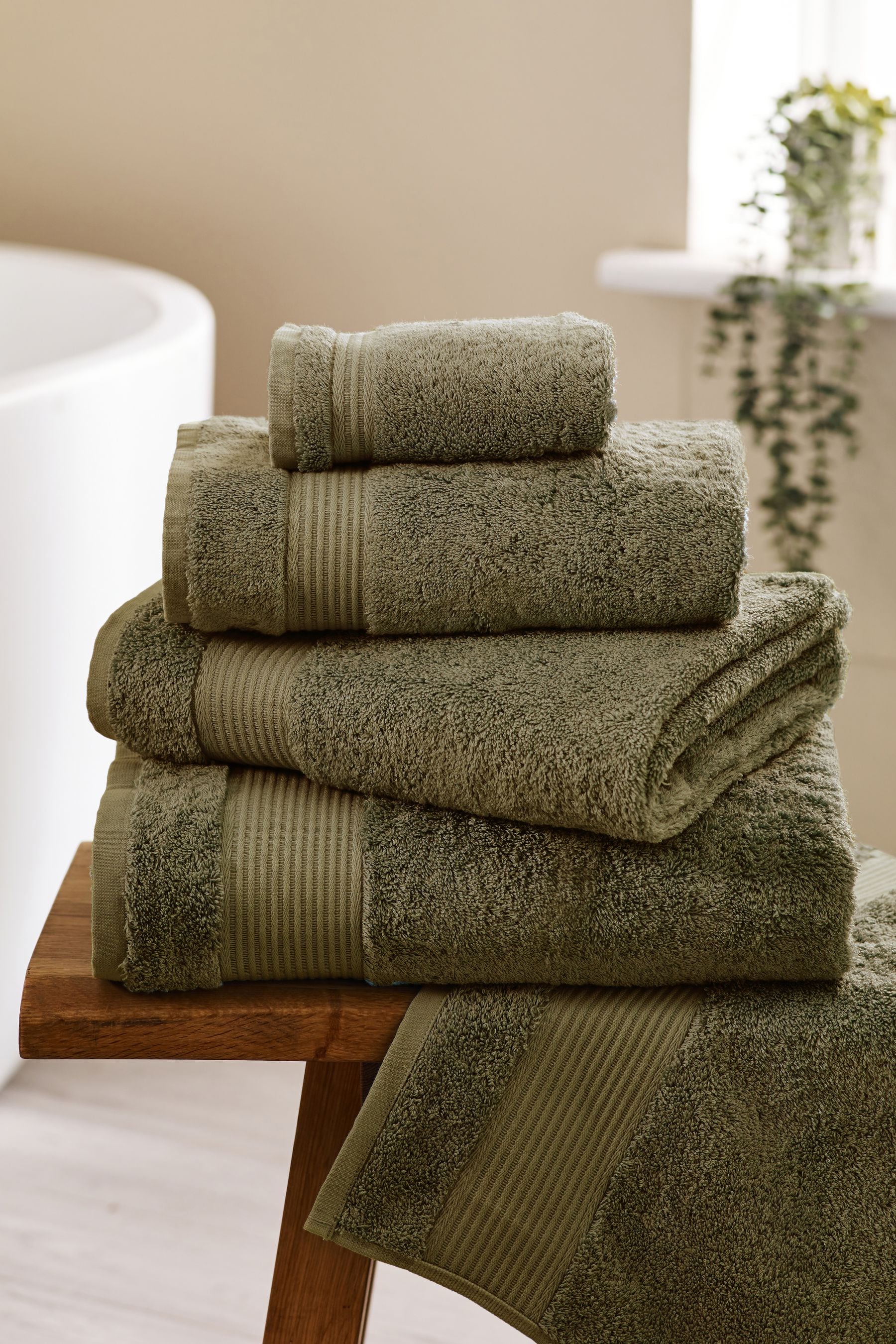 Next bottle top green towels