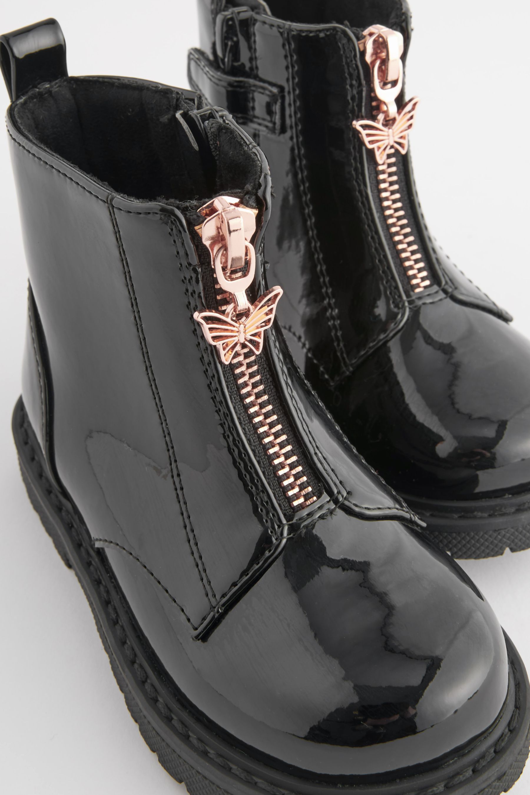 Black patent boots with zip shop up front