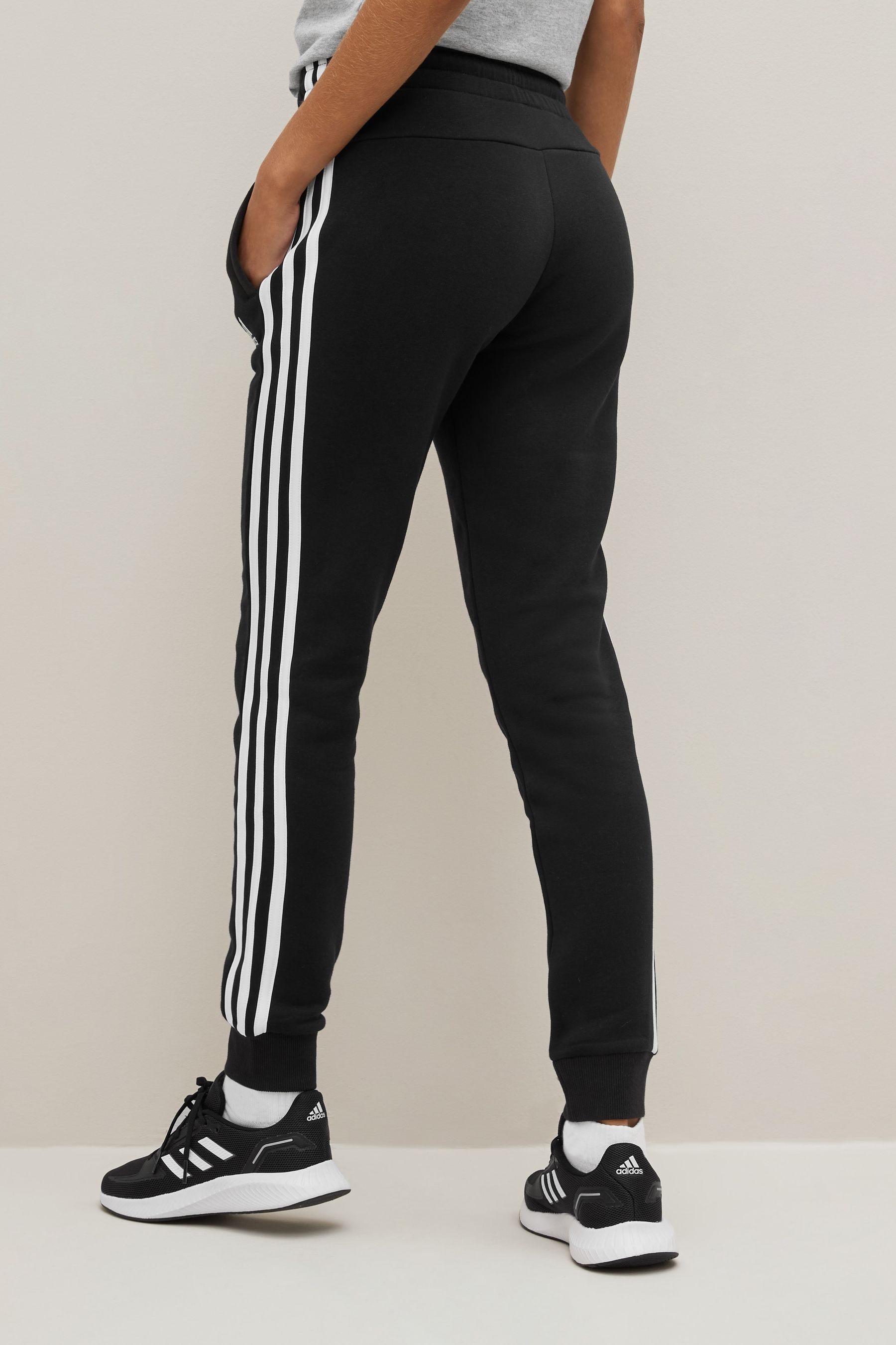 Adidas black and online white striped joggers
