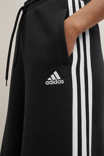 Buy adidas Black Sportswear Essentials Big Logo Fleece Jogger Set Kids from  Next Poland