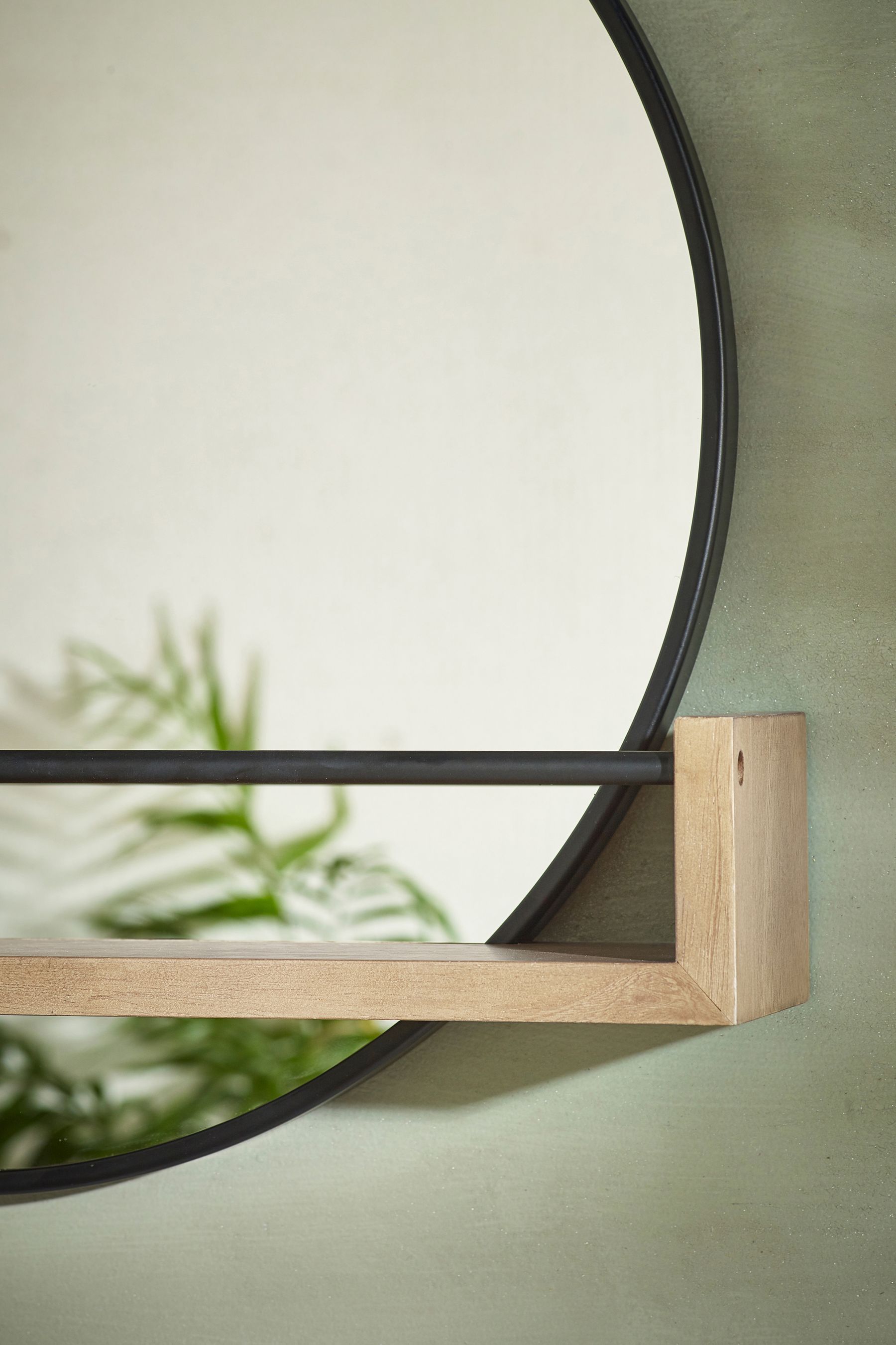 Circle mirror with top shelf