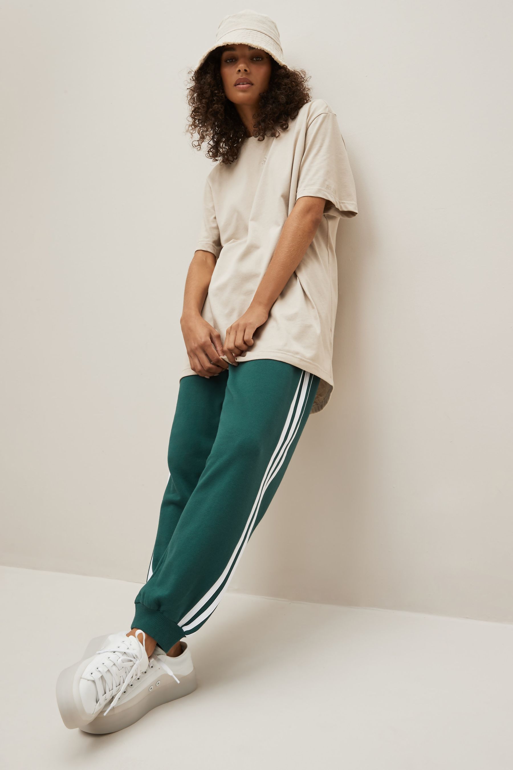 Adidas joggers women sales green