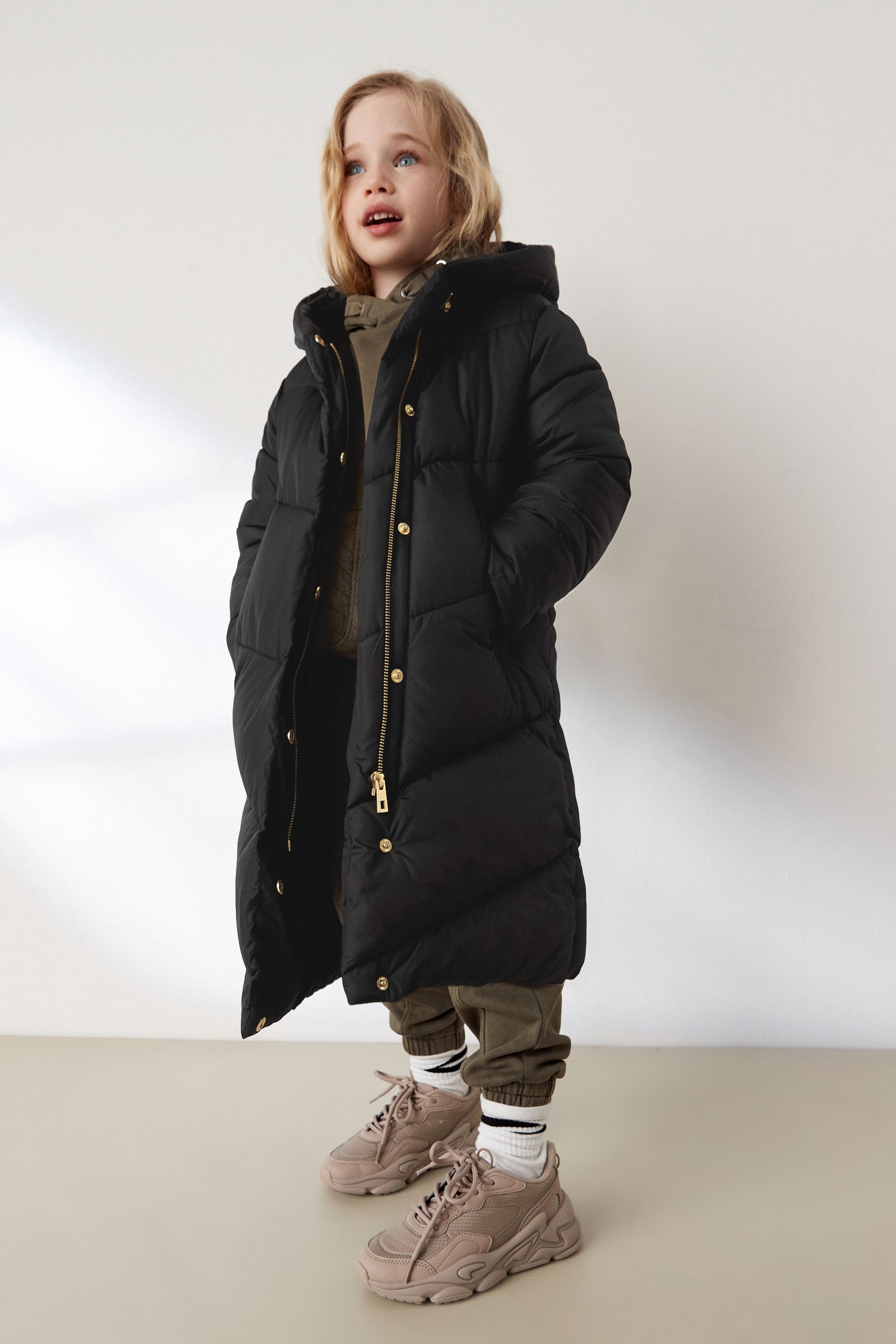 Buy Black Longer Length Shower Resistant Faux Fur Lined Hooded Padded Coat 3 16yrs from the Next UK online shop