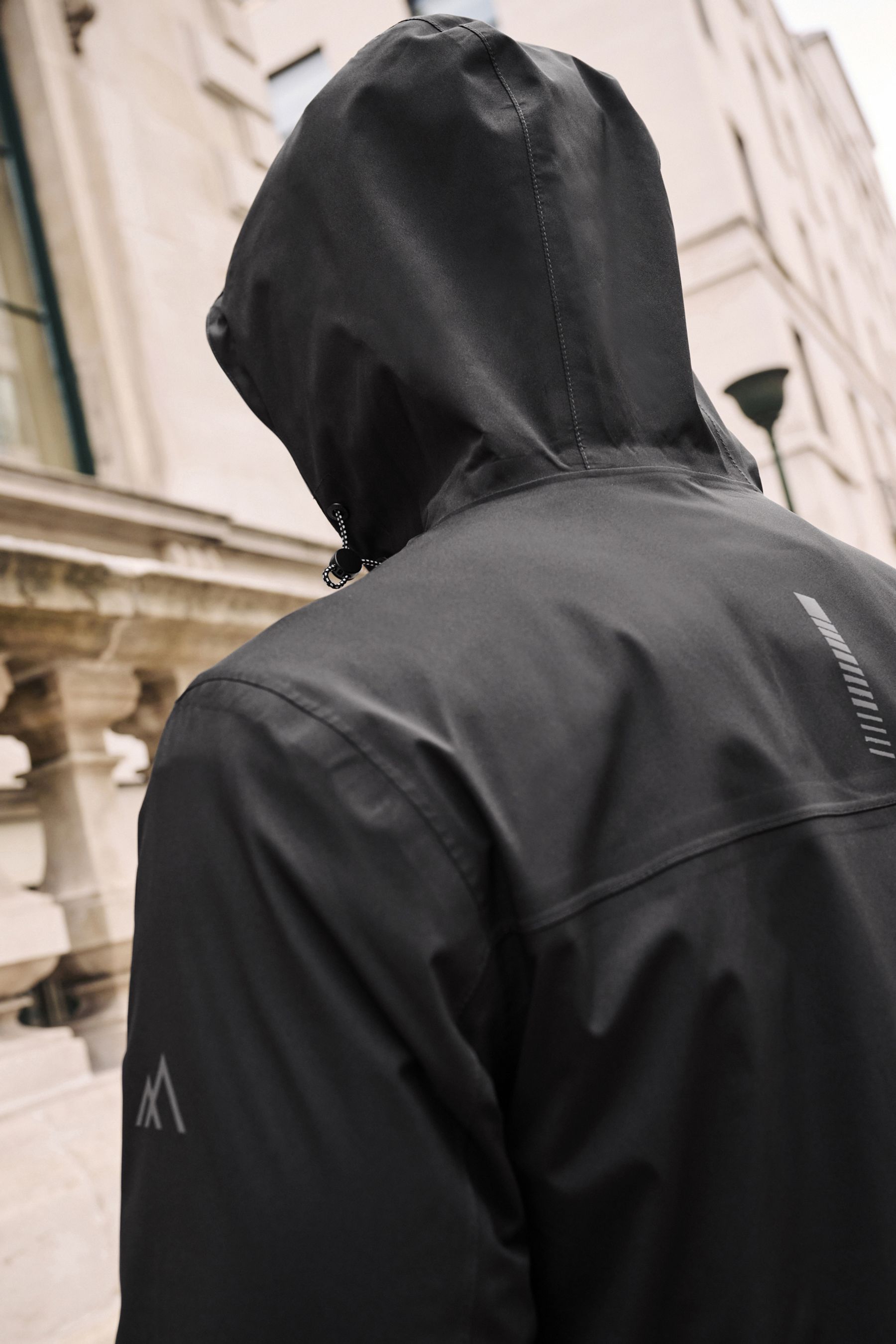 Black long waterproof coat top
