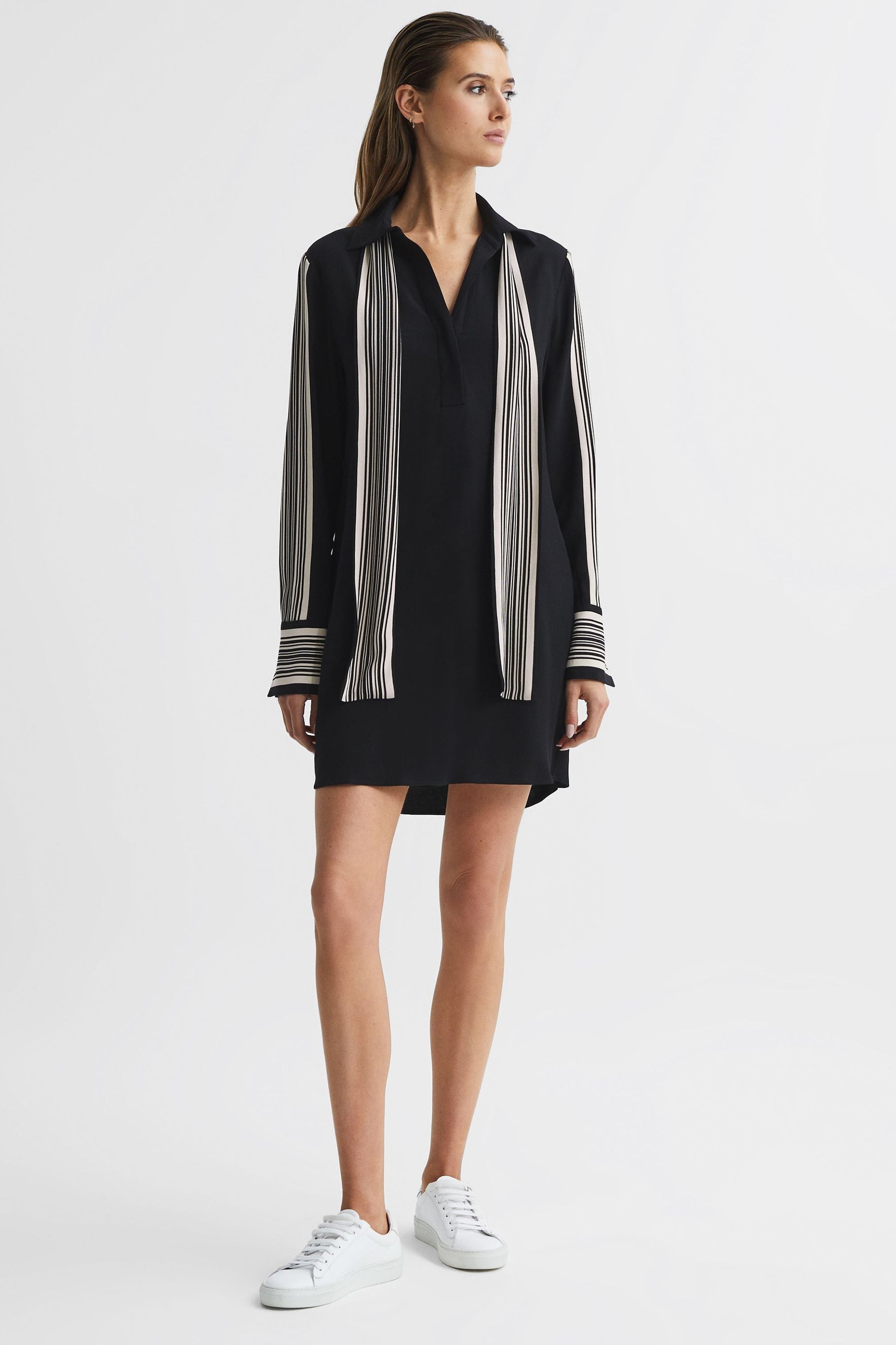 Black dress with white stripe on side 2025