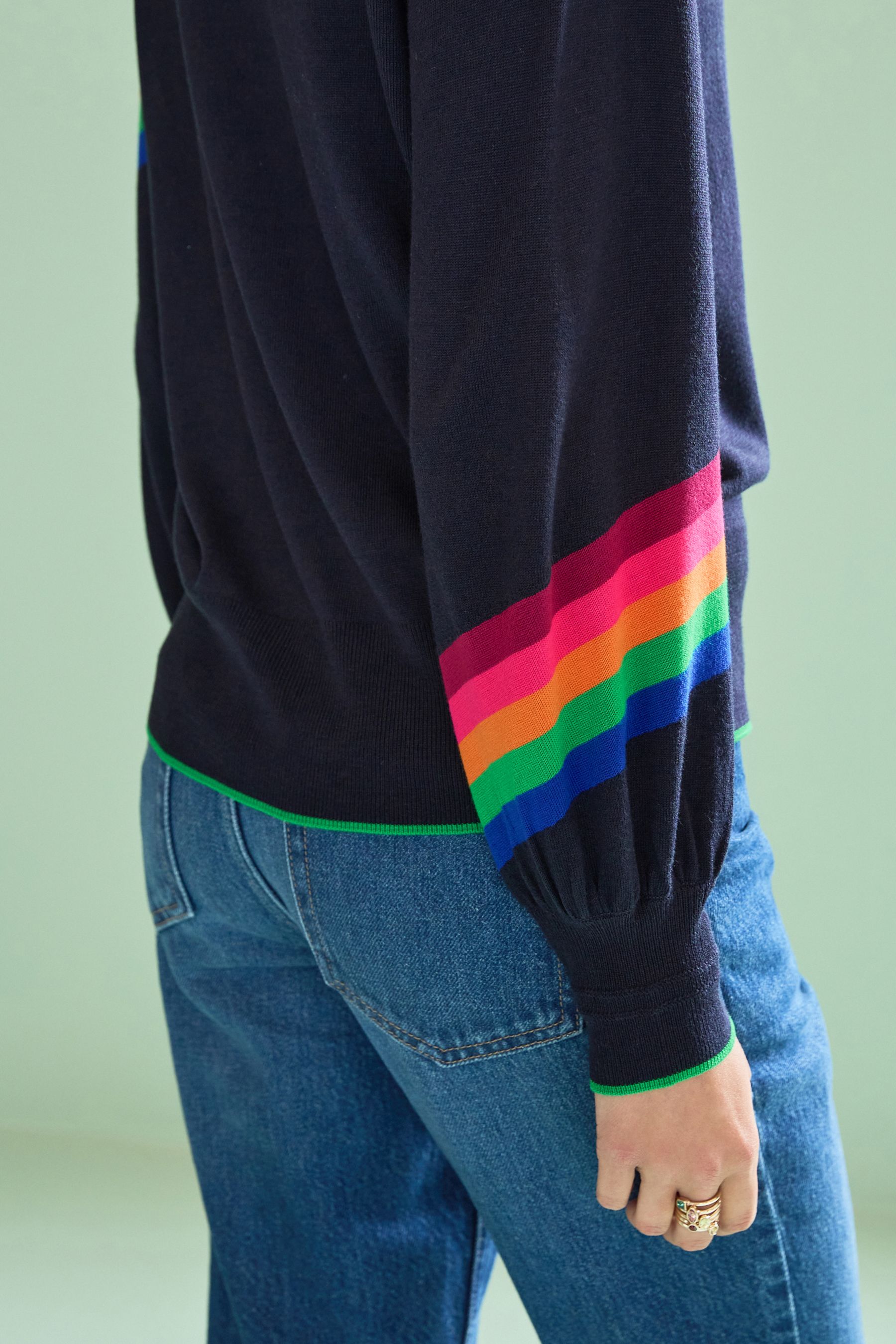 Black jumper clearance with rainbow stripe
