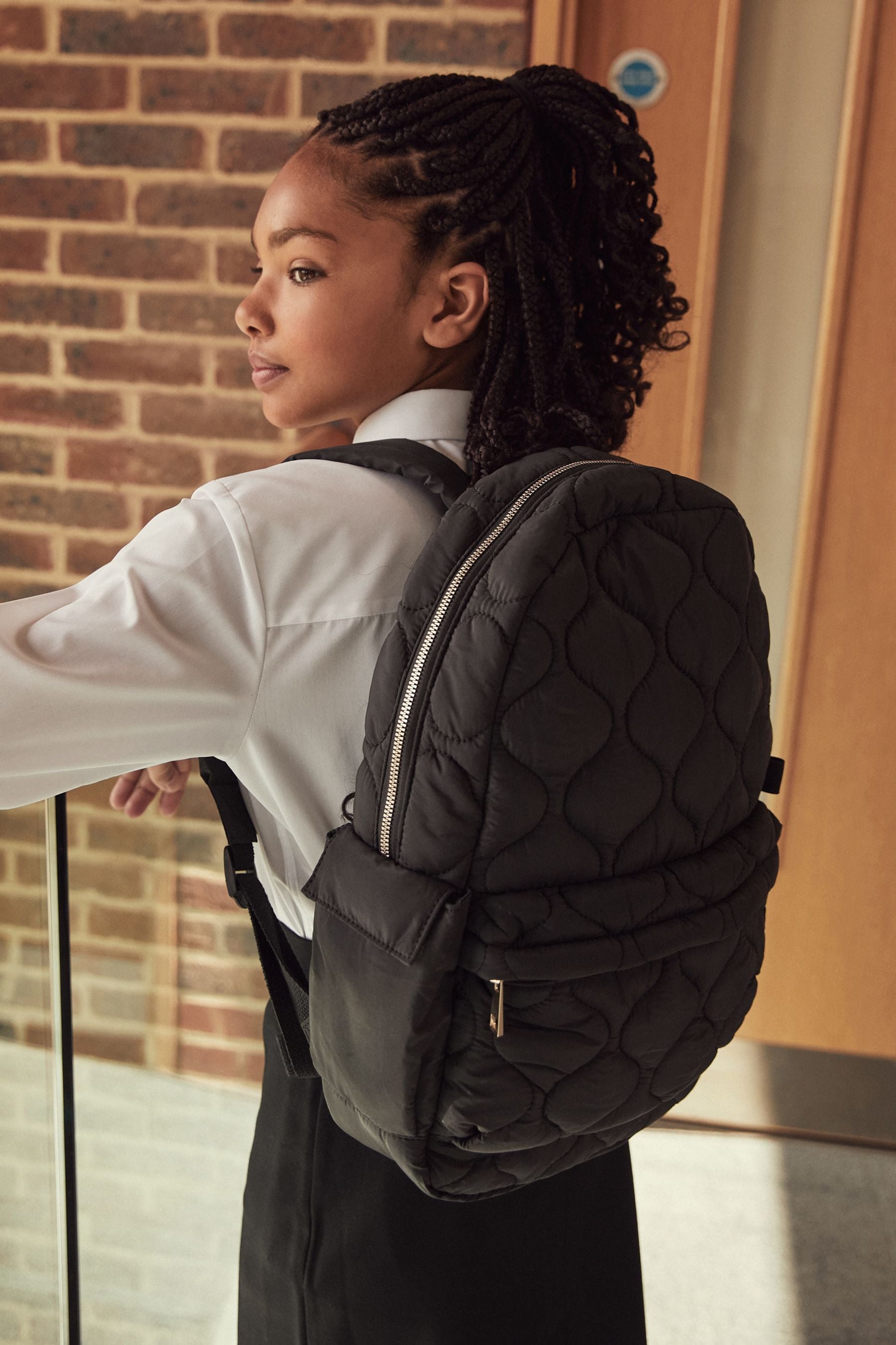 Black quilted store mini backpack
