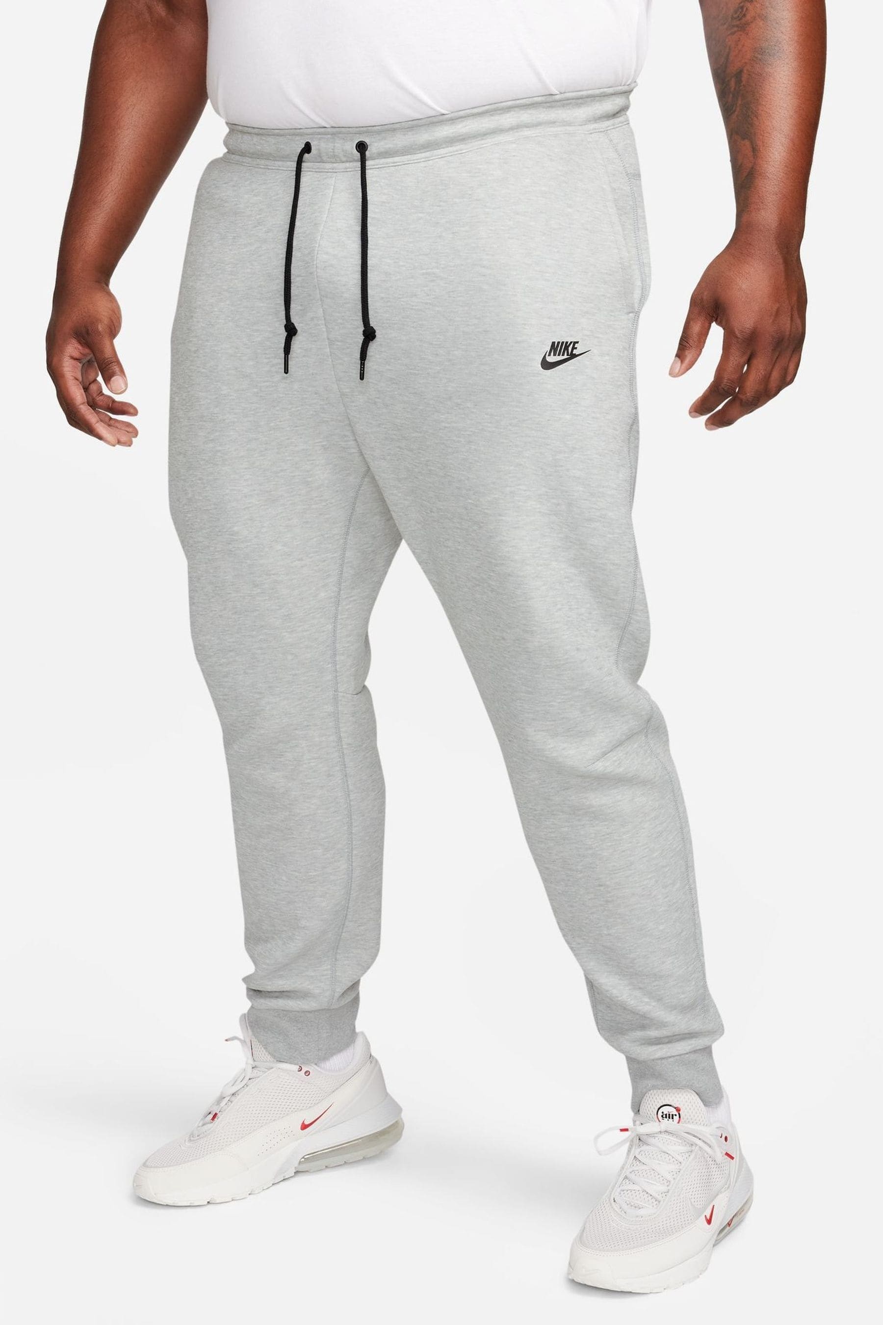 Nike joggers with zippers on sale