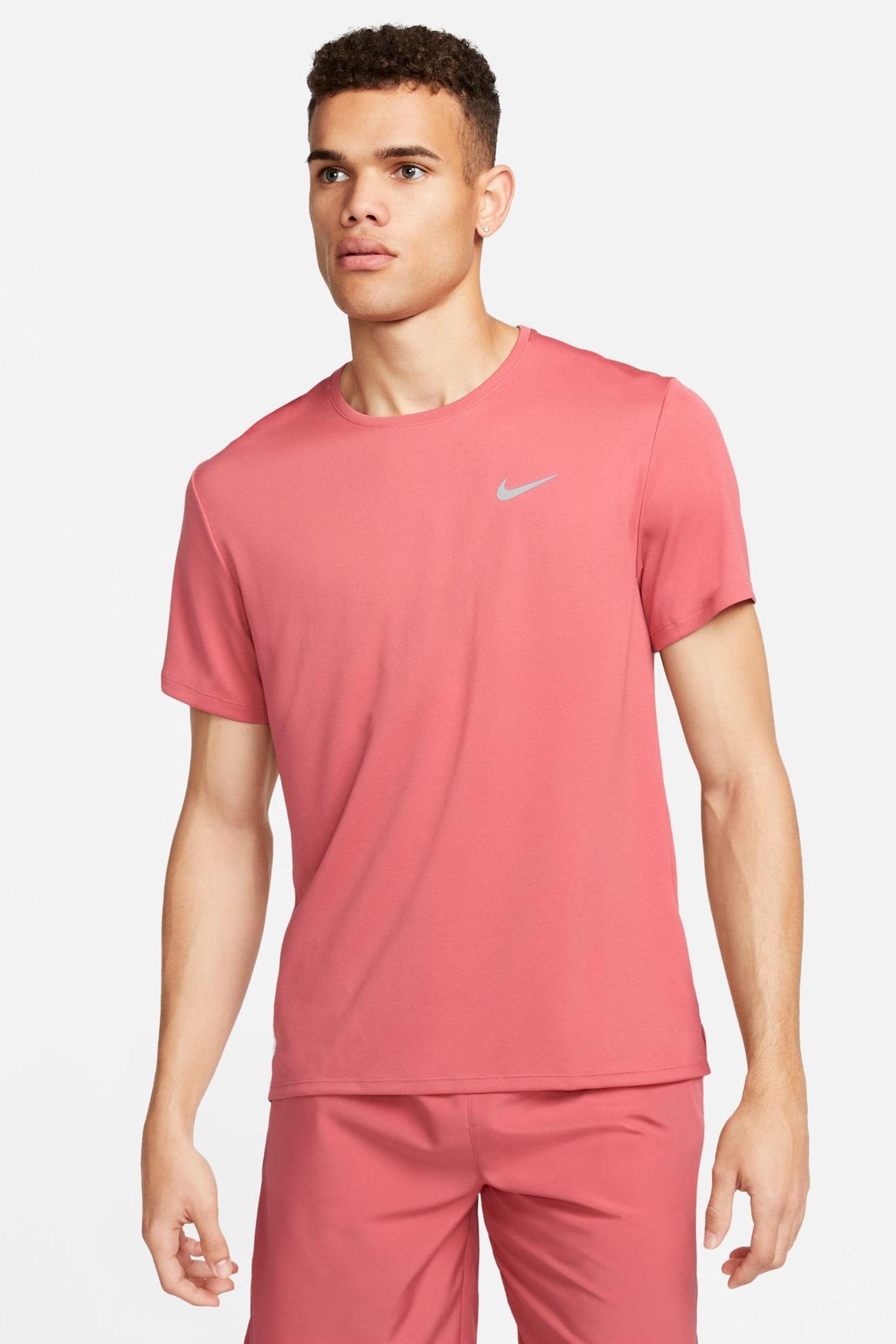 Baby pink on sale nike top
