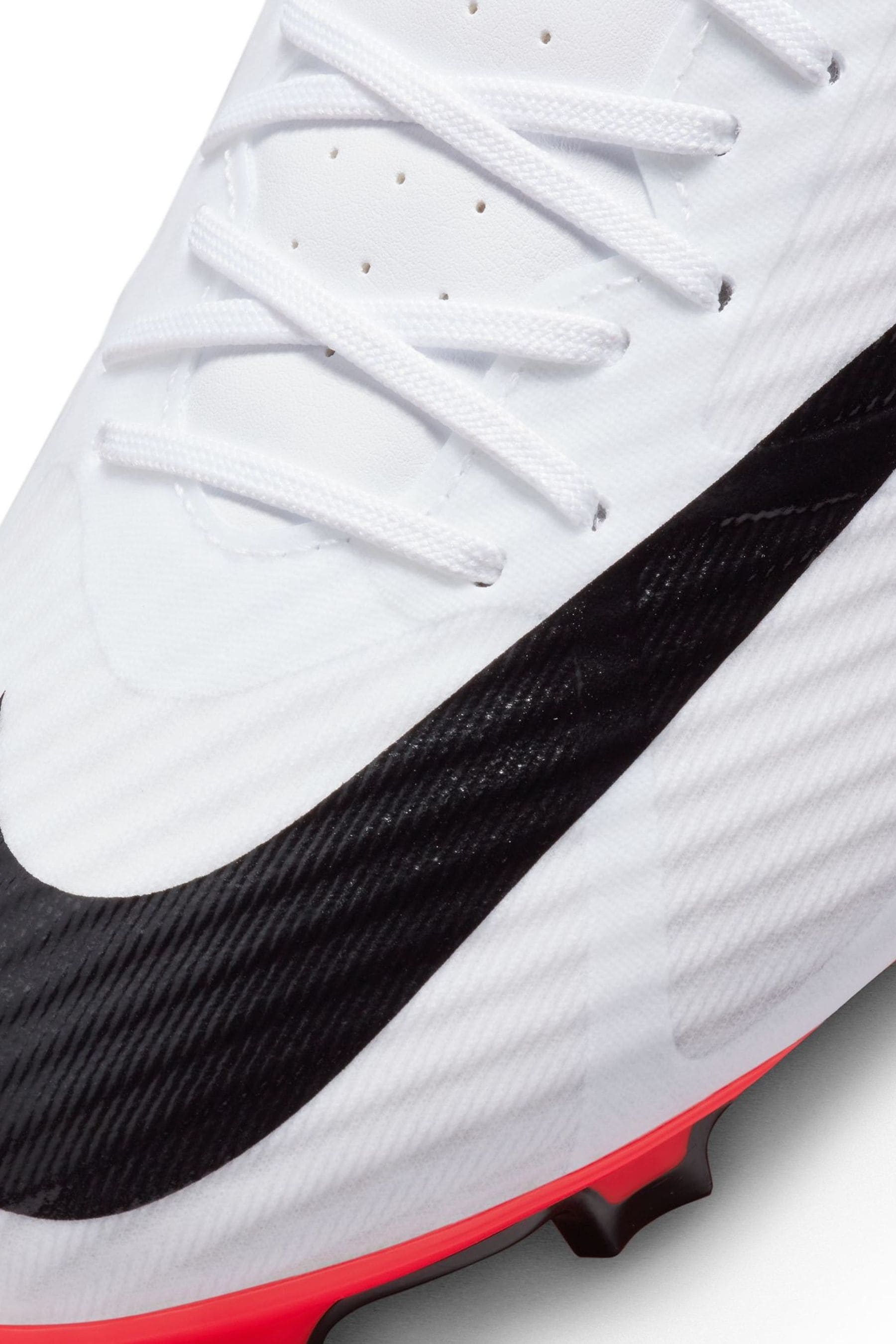 Red and sale white soccer cleats
