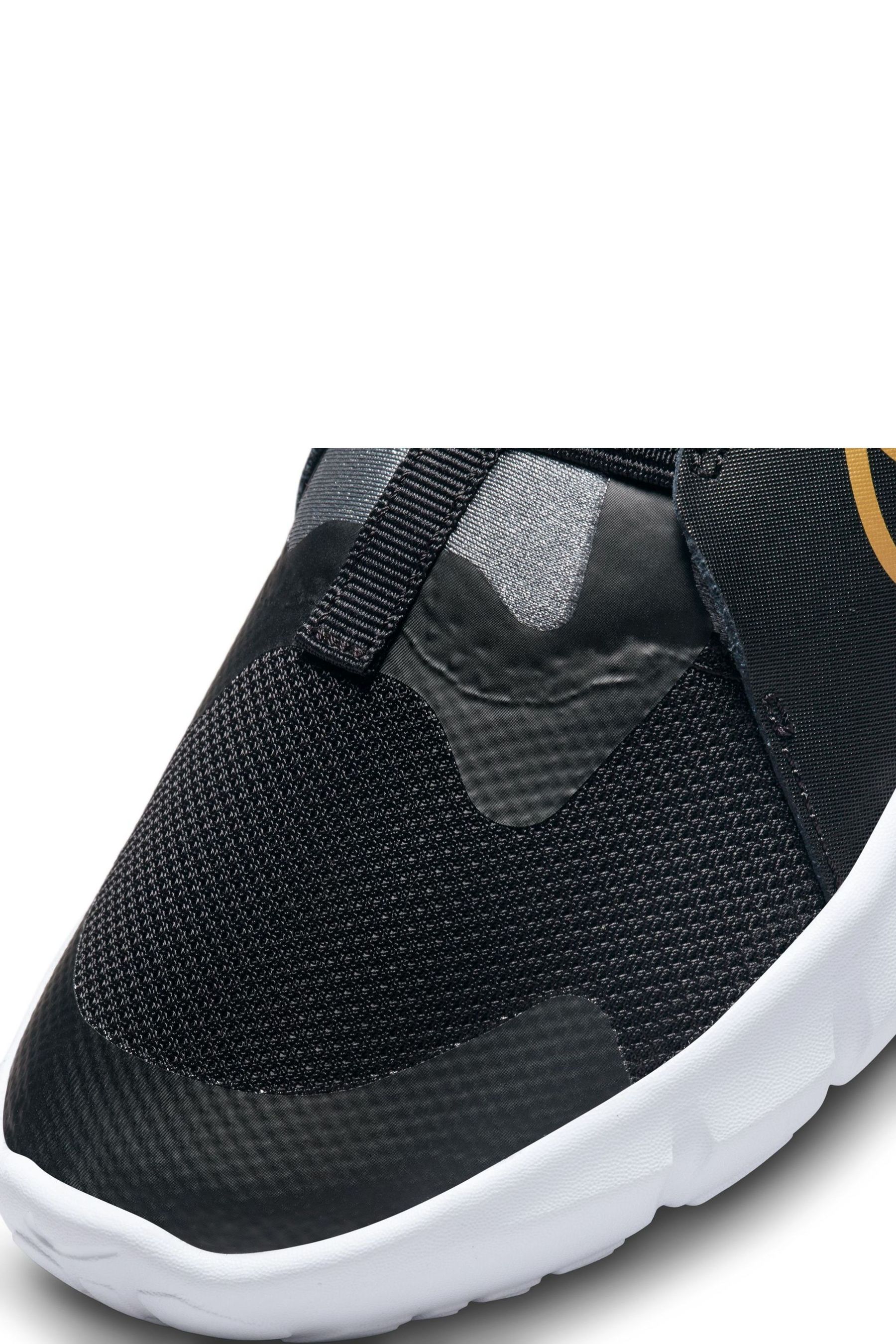 Nike black gold trainers top