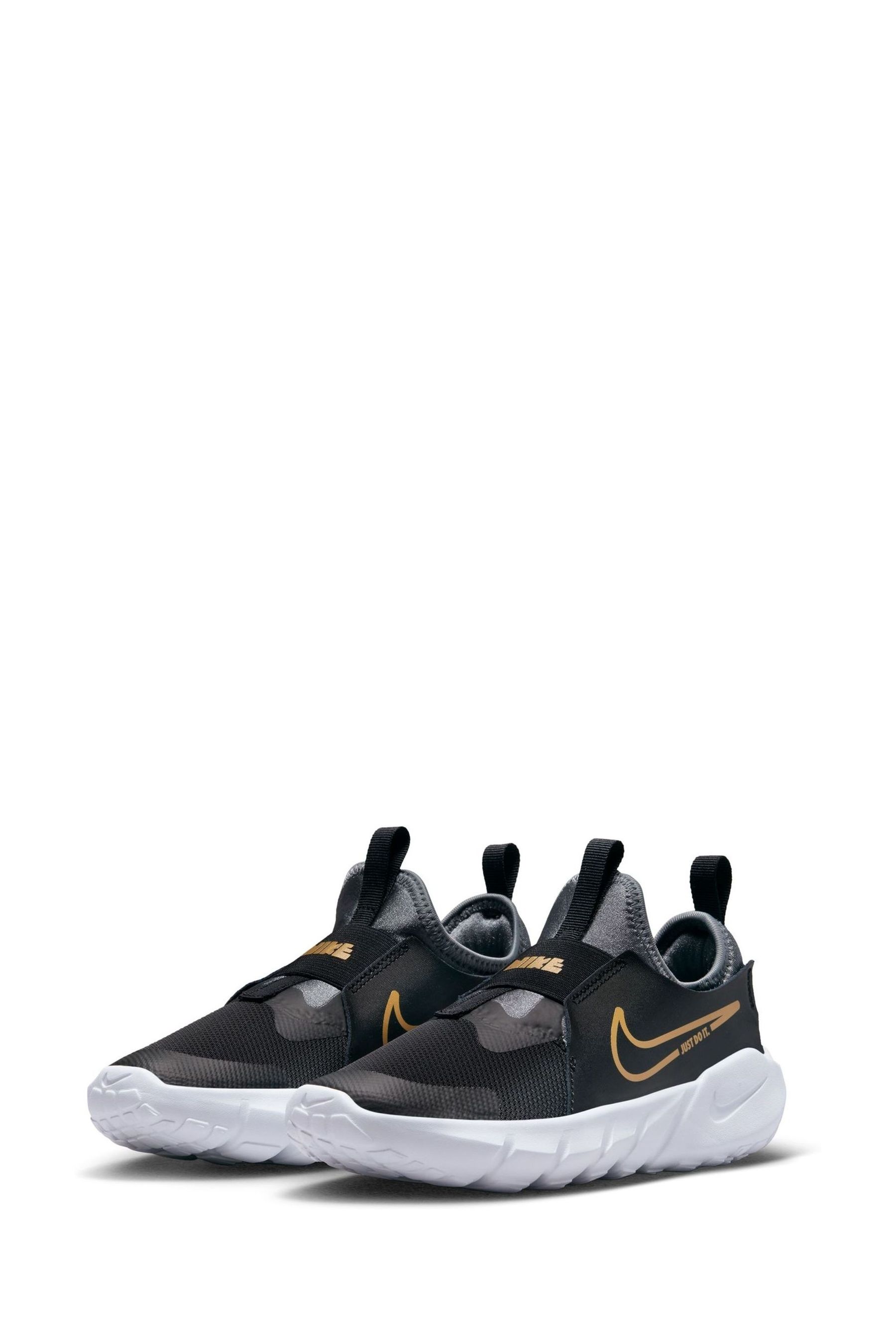 Buy Nike Black Gold Flex Runner 2 Junior Trainers from the Next UK