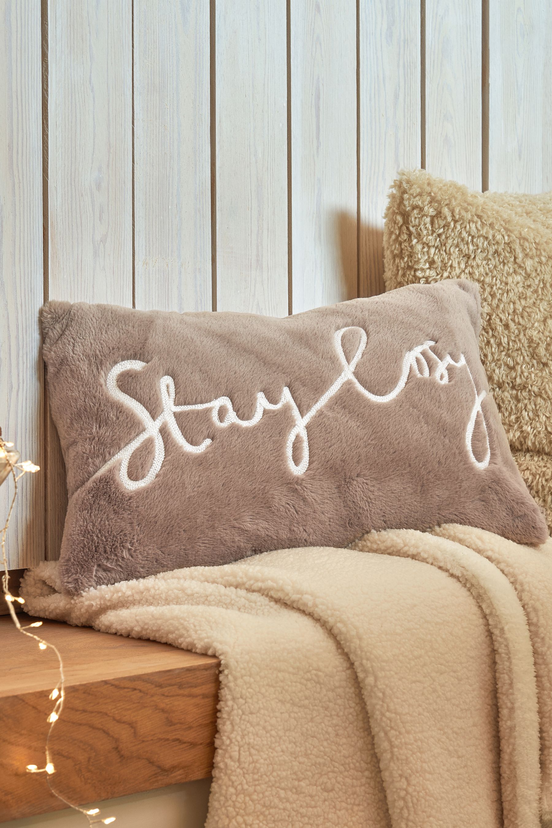 Buy Natural Stay Cosy Faux Fur 50 x 30cm Cushion from the Next UK