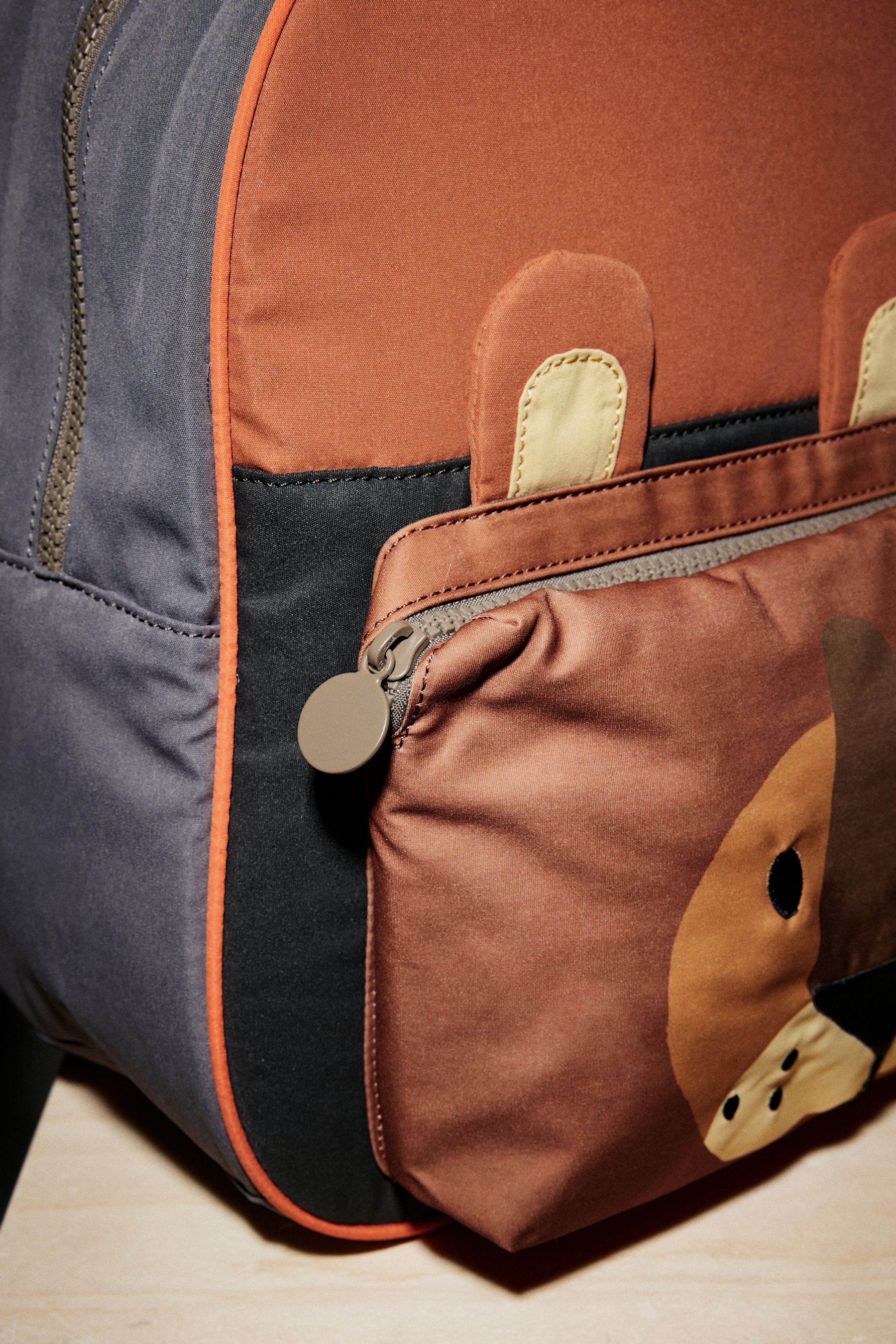 Lion top backpack designer