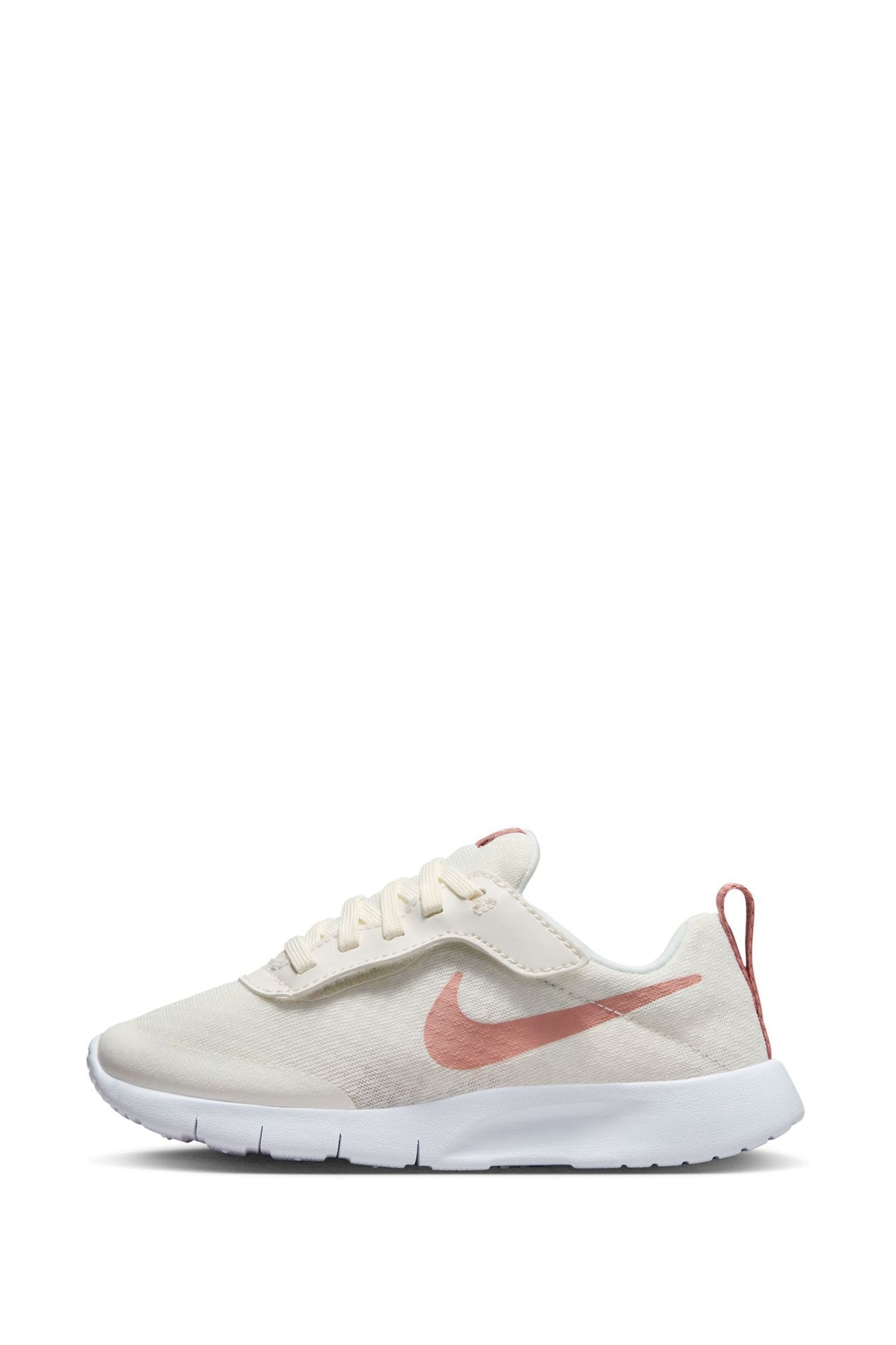 Buy Nike White Pink Tanjun Go Easy On Junior Trainers from the