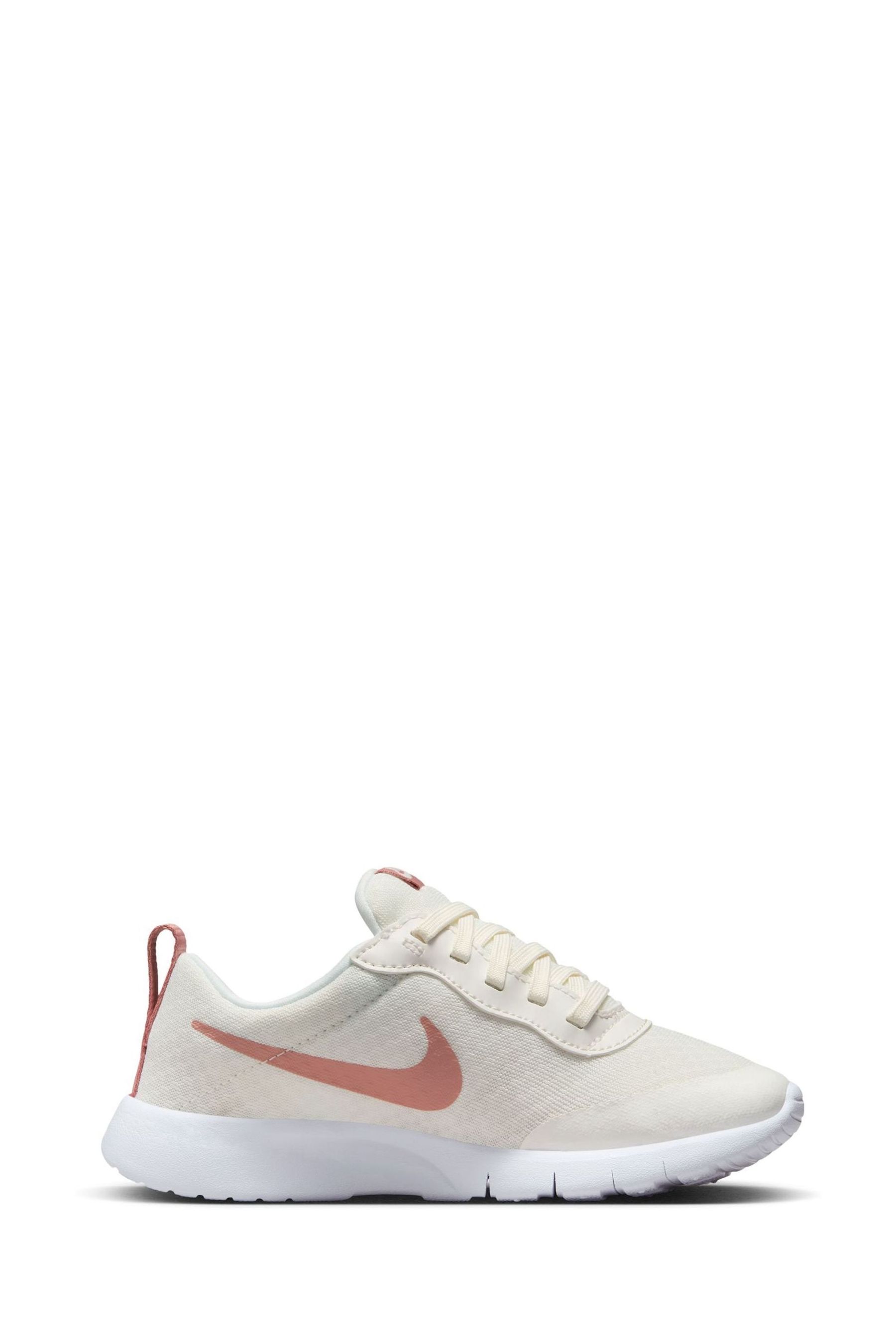 Buy Nike White Pink Tanjun Go Easy On Junior Trainers from the