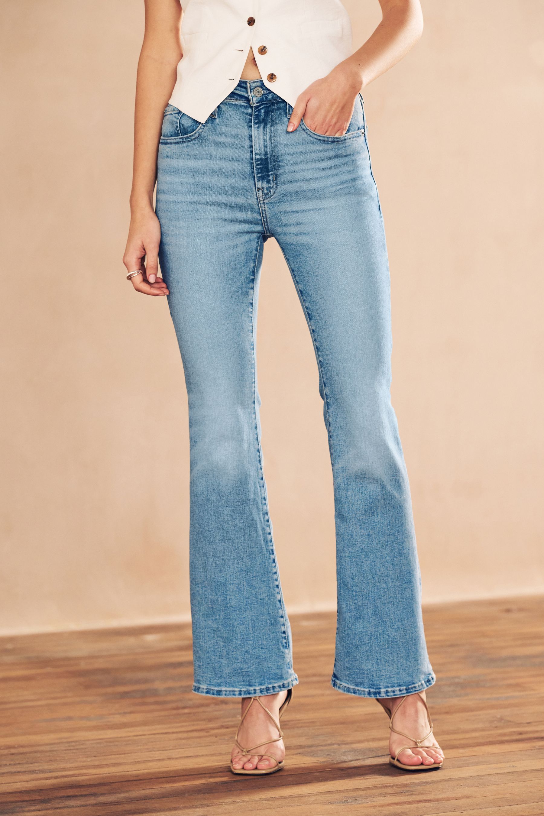 Bell bottom high rise jeans top