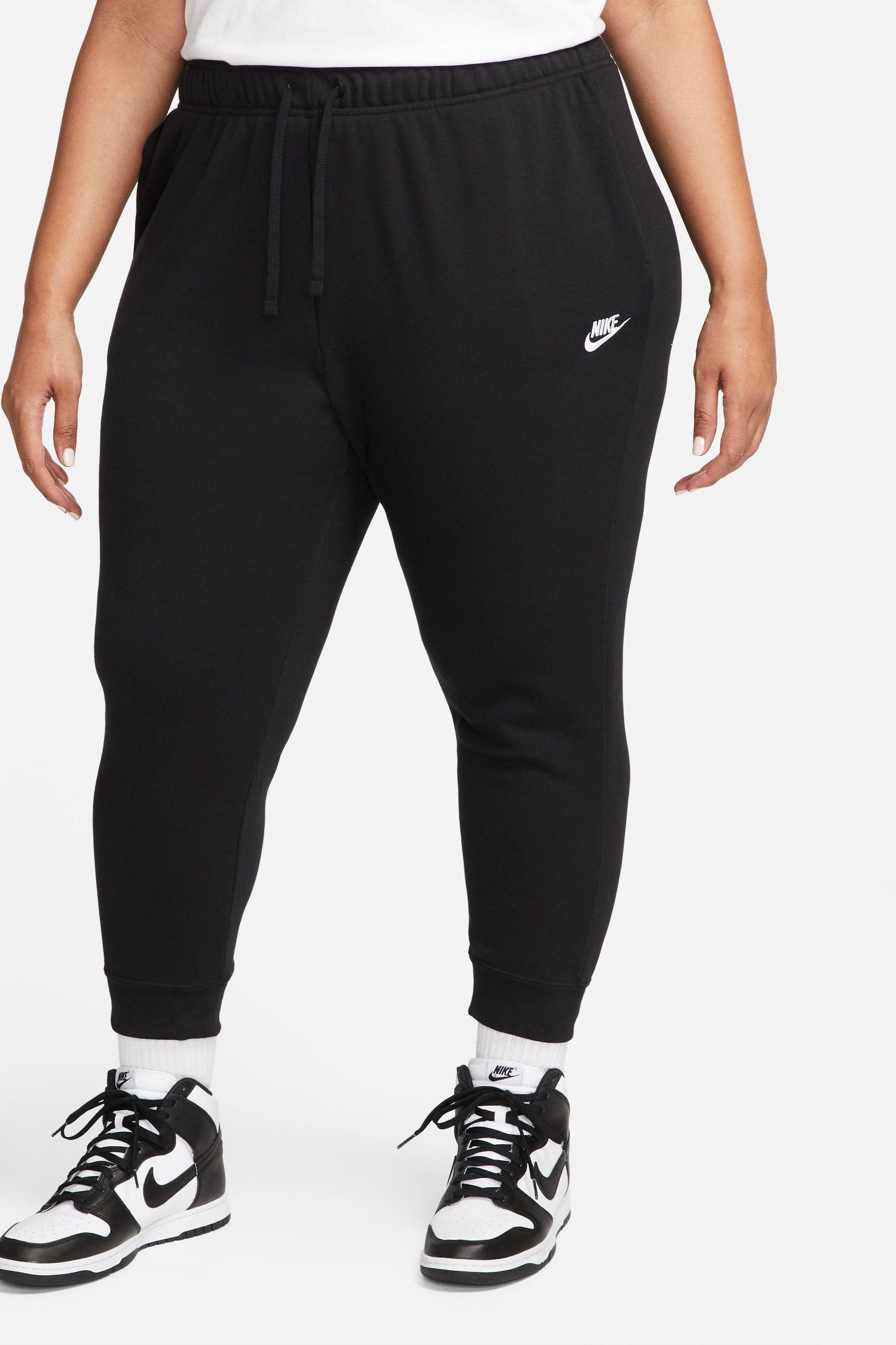 Buy Nike Black Curve Club Joggers from the Next UK online shop