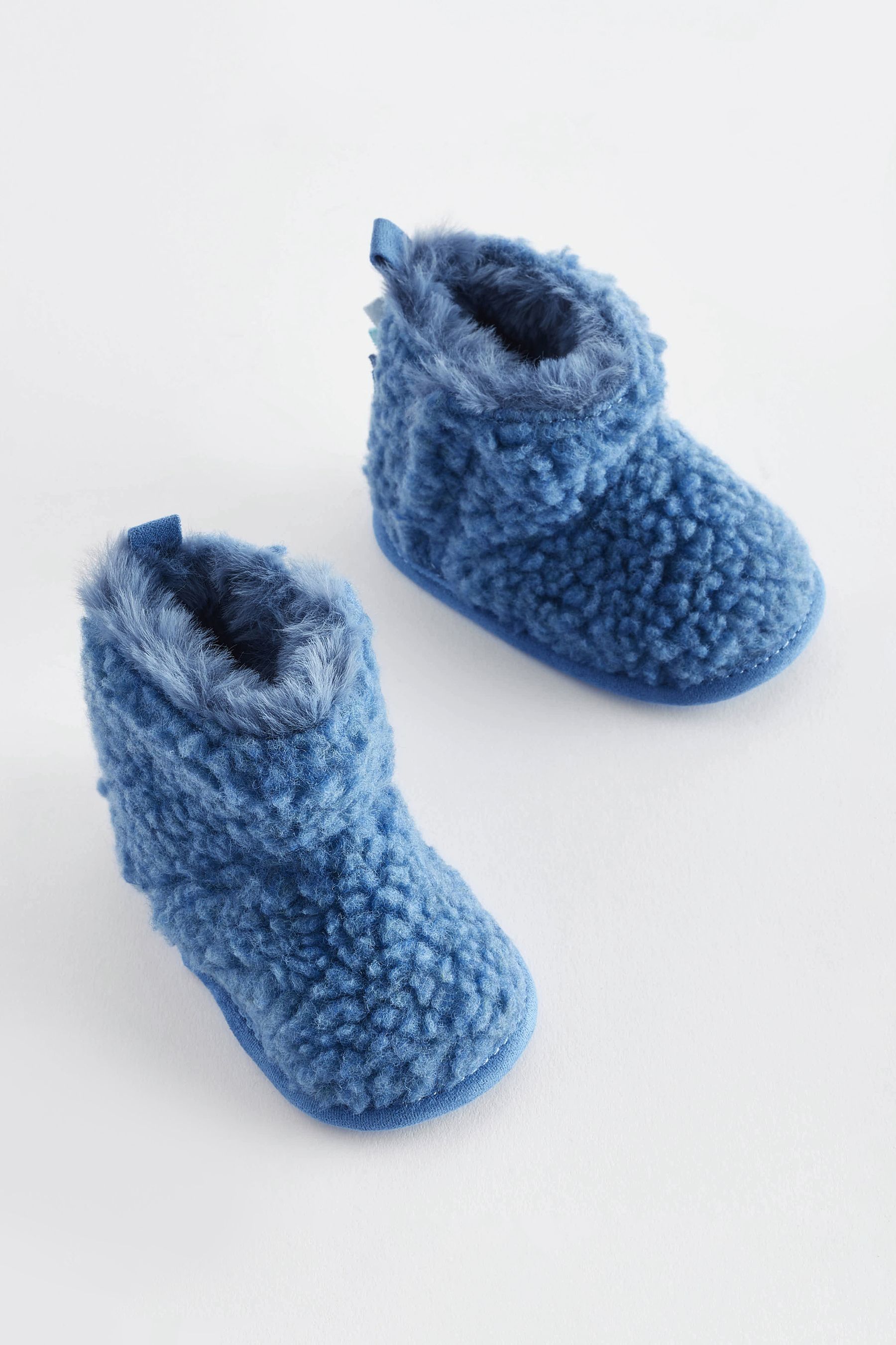 Blue slipper boots deals