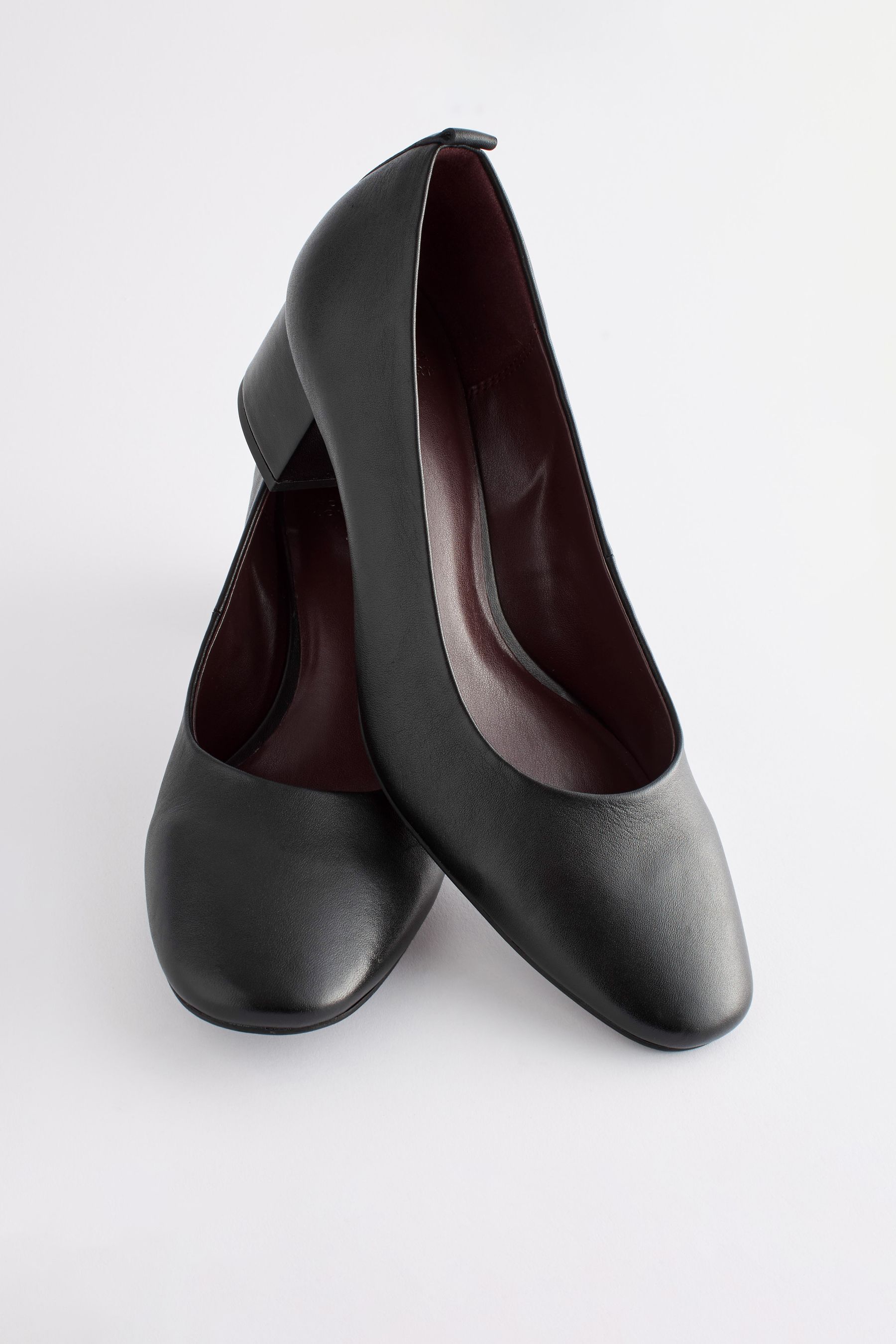 Black flat hot sale heel shoes