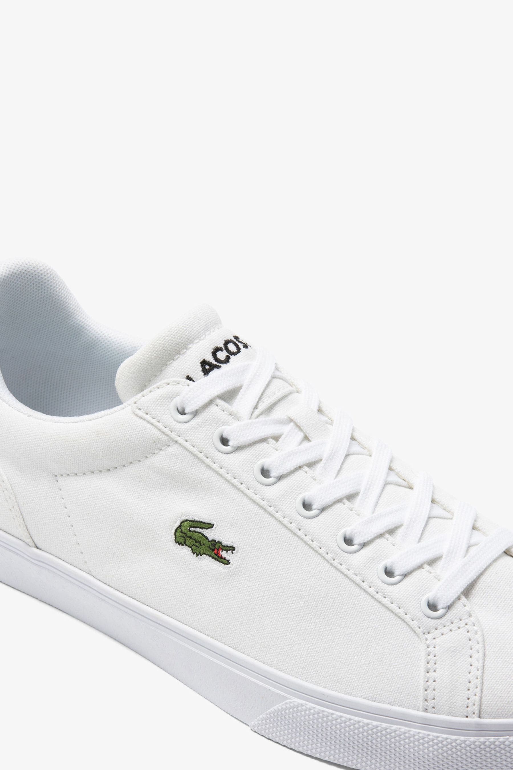 White lacoste leather best sale trainers