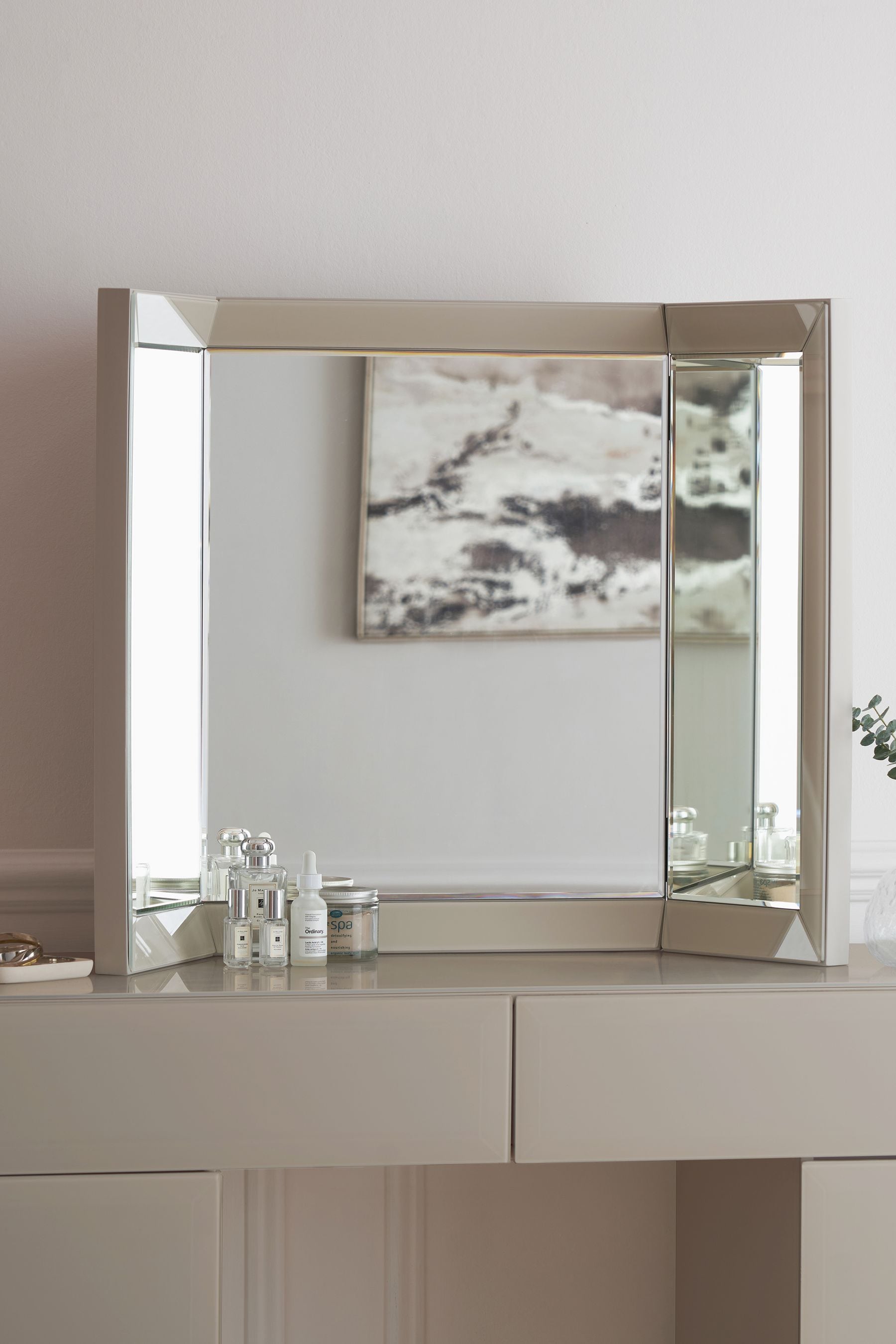 Dressing table outlet mirror on wall
