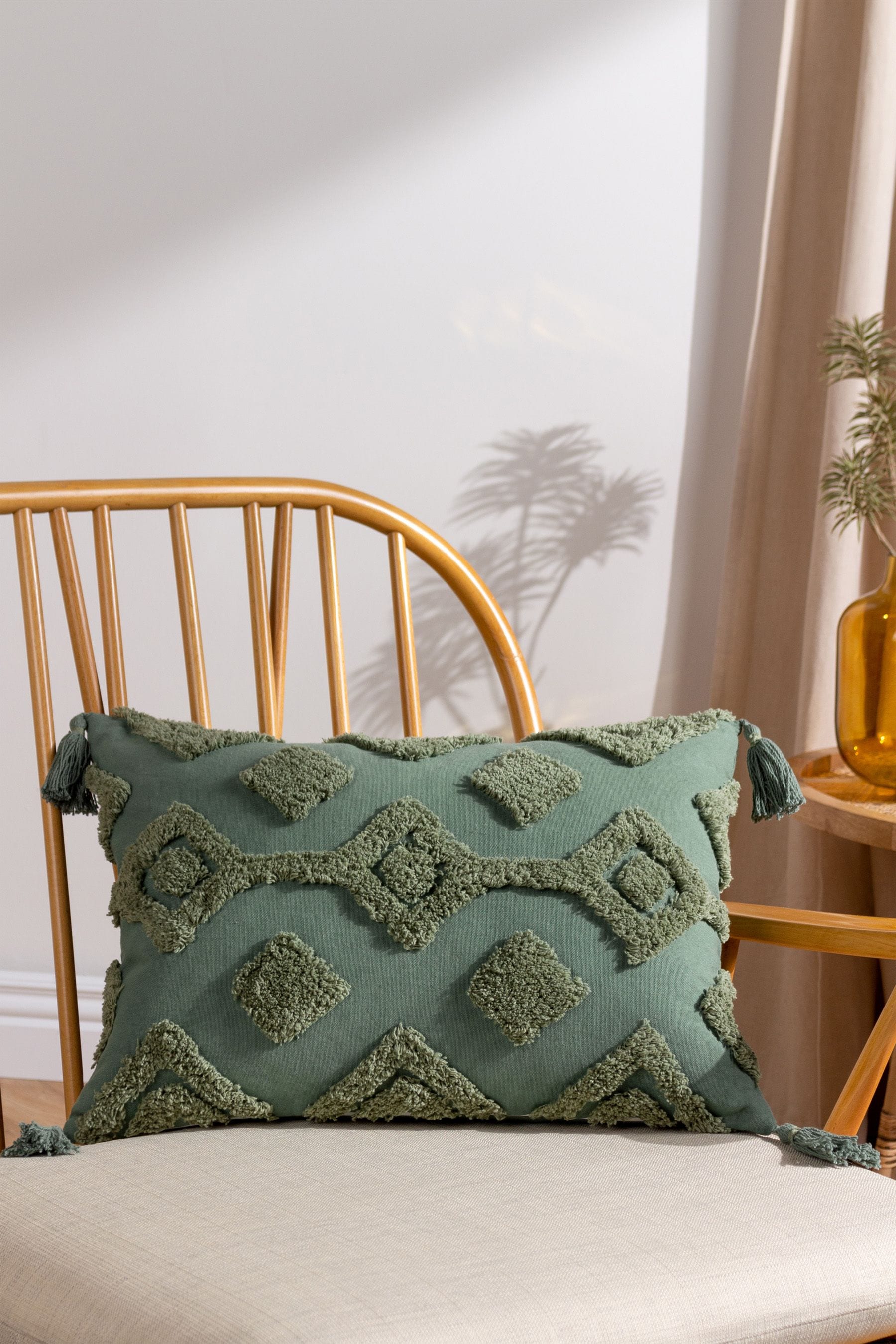 Green sales tassel cushion