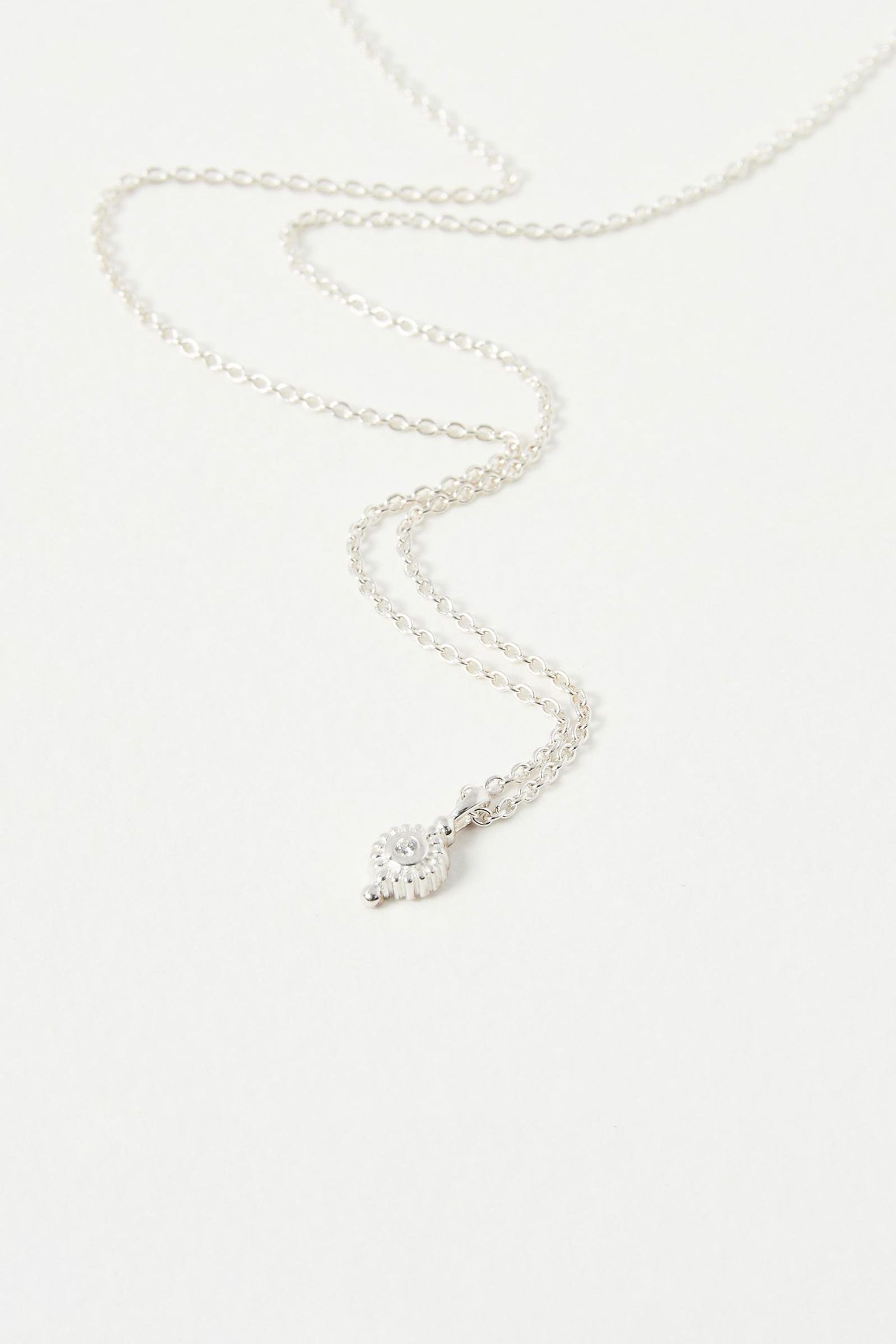 Oliver Bonas Silver Tone Afan Circle Charm Pendant Necklace