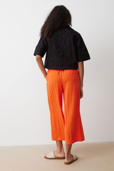 Oliver Bonas Coral Orange Cropped Pleated Trousers