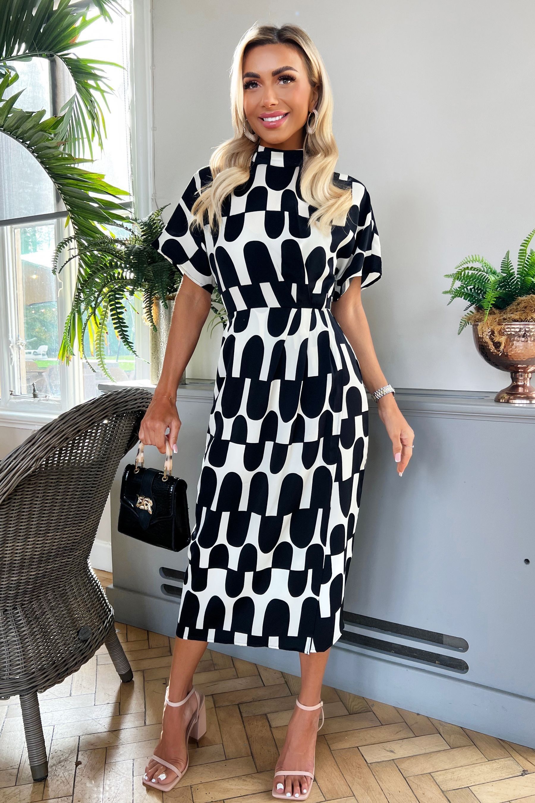Black and cream knee length skirt online