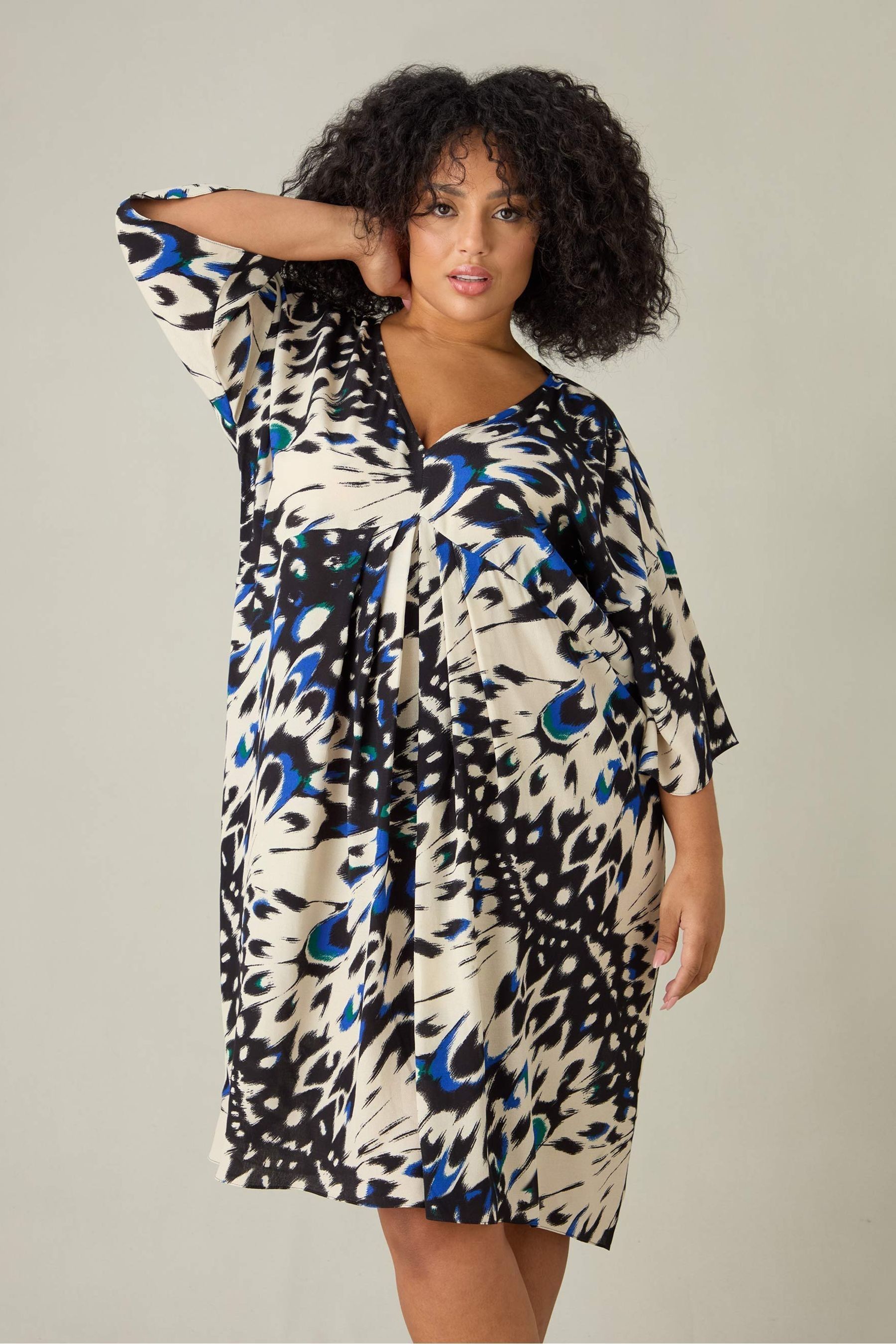 Leopard print dress with blue butterflies sales