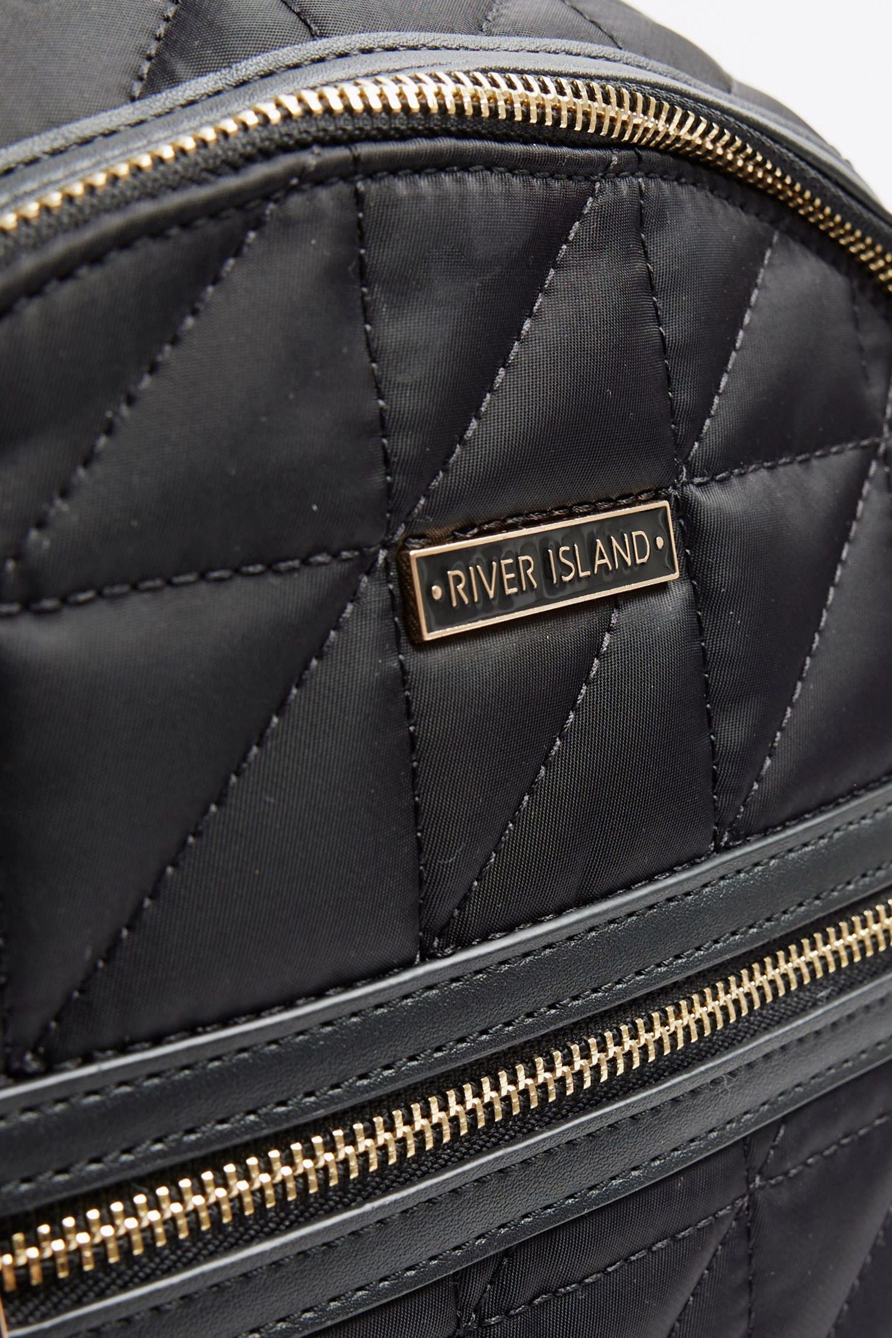 Black backpack river island top
