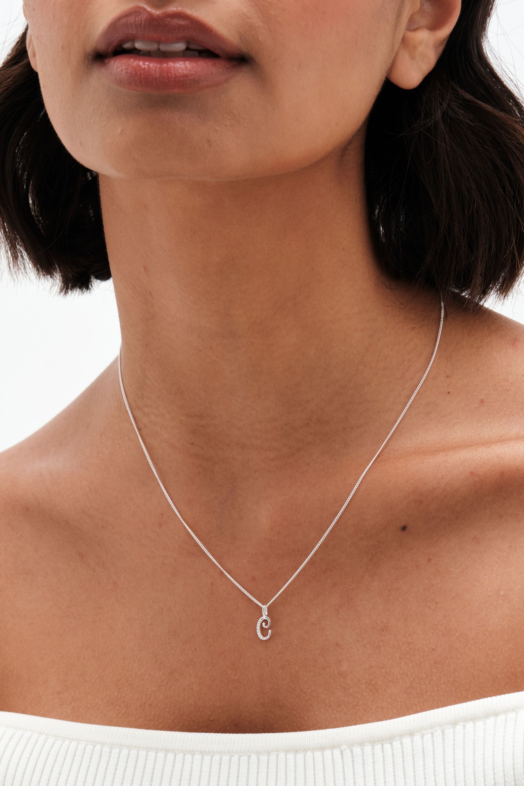 Cubic zirconia initial pendant deals