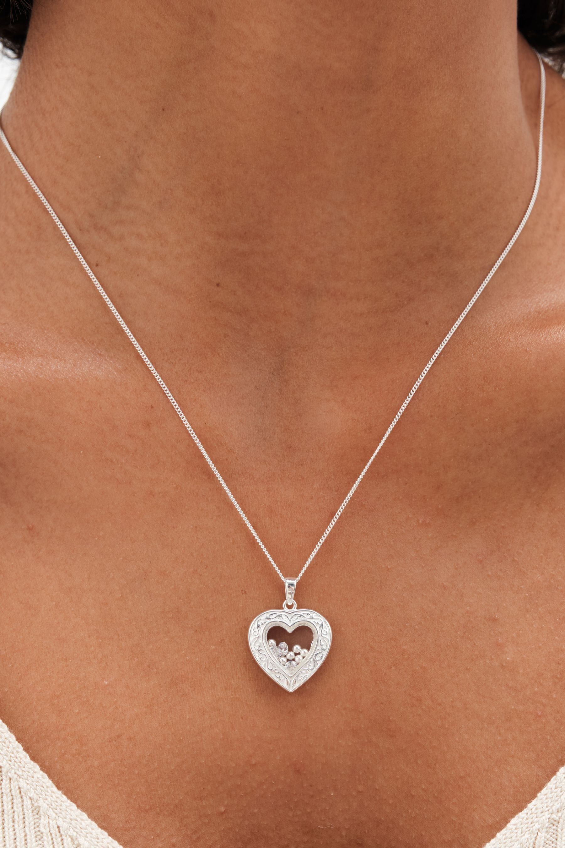 Buy Simply Silver Silver Tone Sterling 925 Cubic Zirconia Heart Shaker Necklace from the AspennigeriaShops online shop