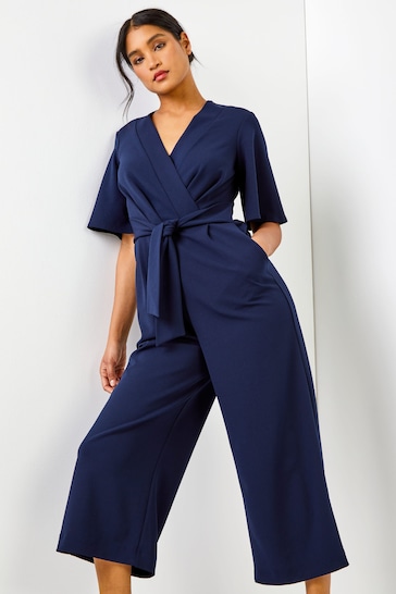 Buy Roman Navy Blue Angel Sleeve Wrap Jumpsuit from the Next UK online shop