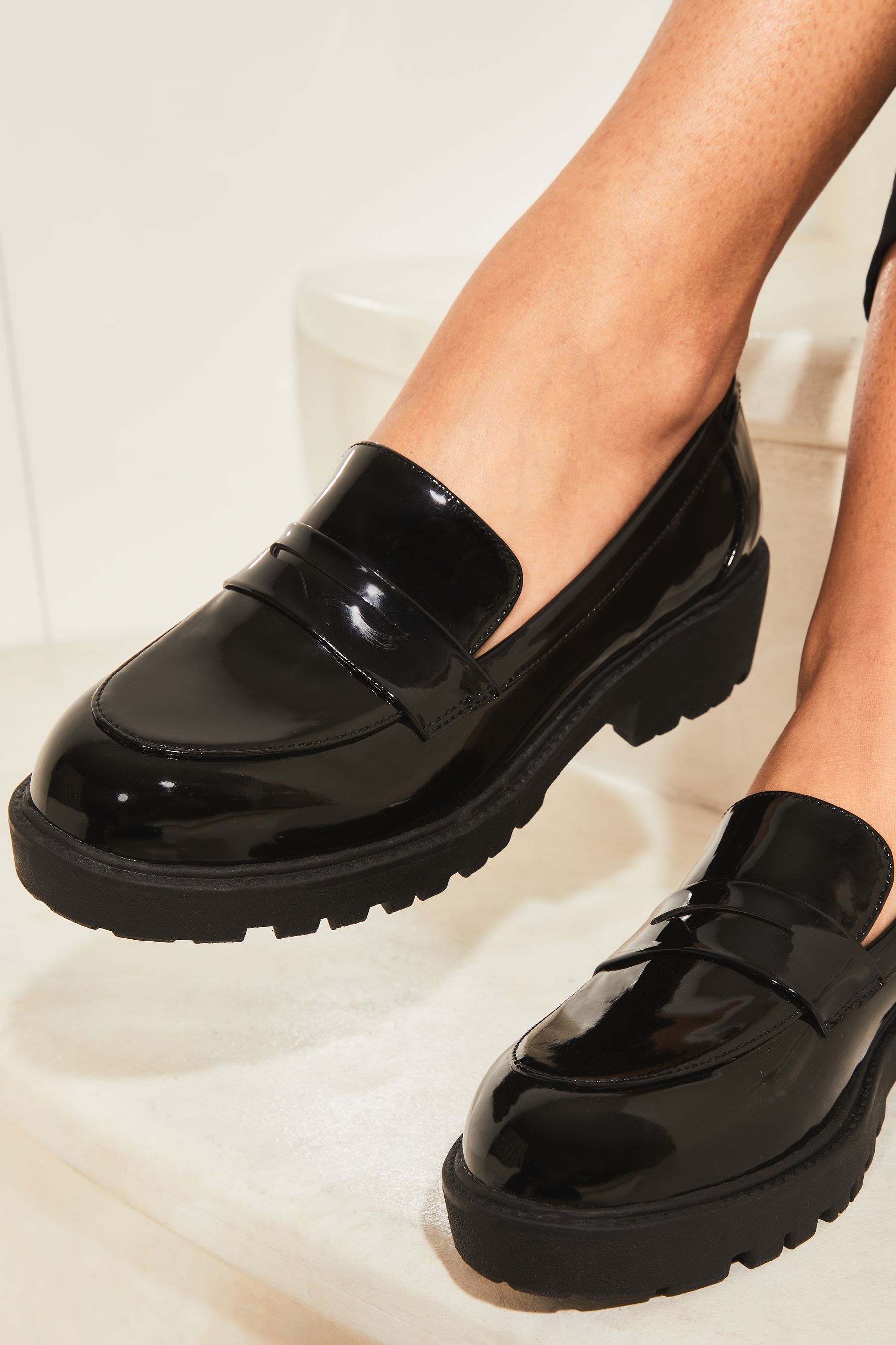 Chunky black shop patent loafers