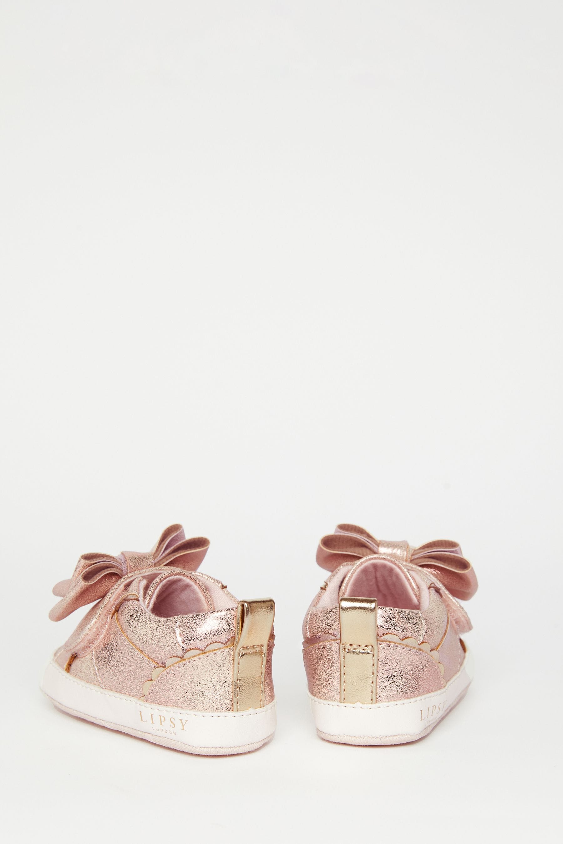 Pink trainers deals with bows