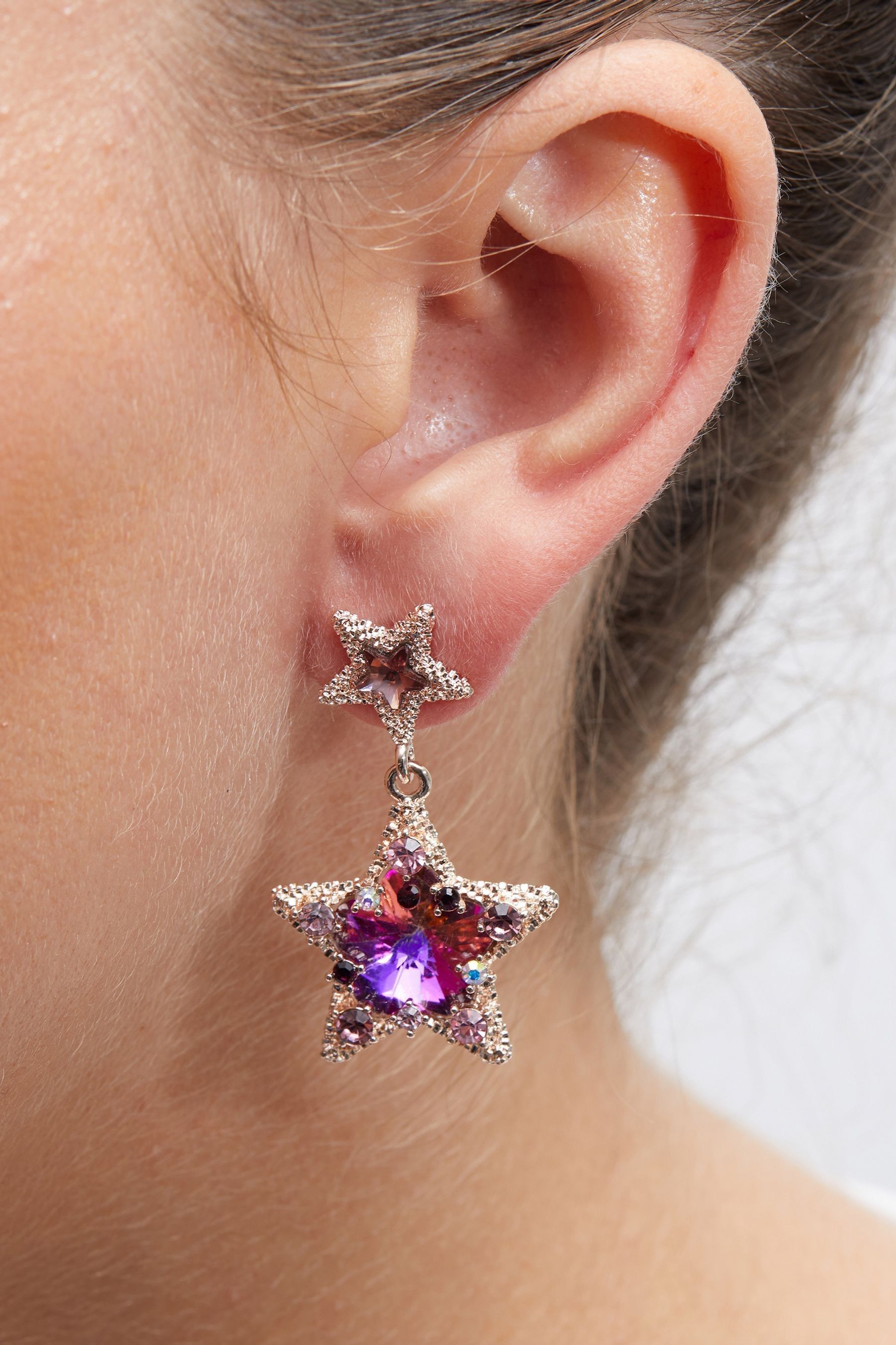 Gold starburst discount drop earrings