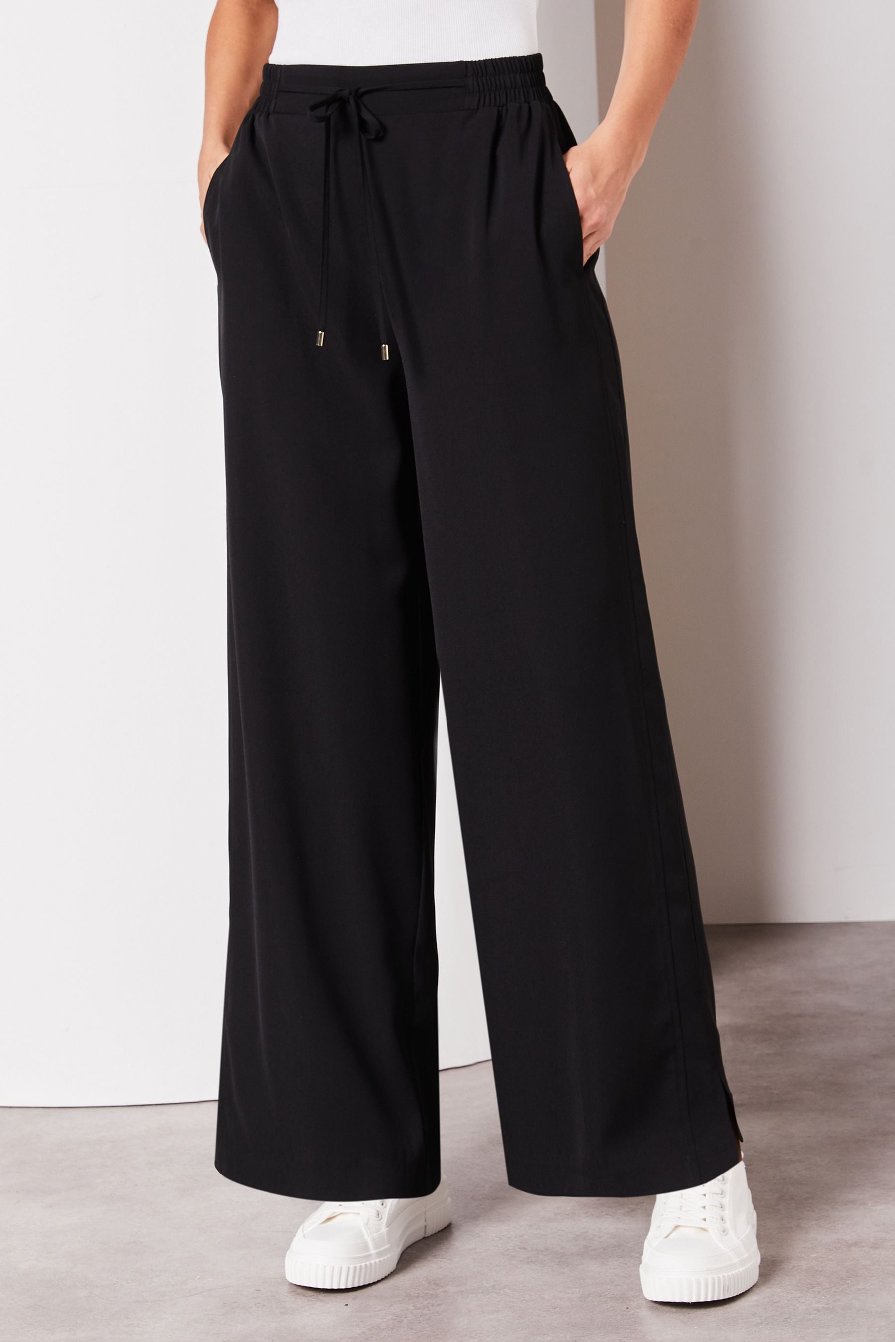 Buy Lipsy Black Wide Leg Split Hem Jogger Trousers from the Next UK online shop