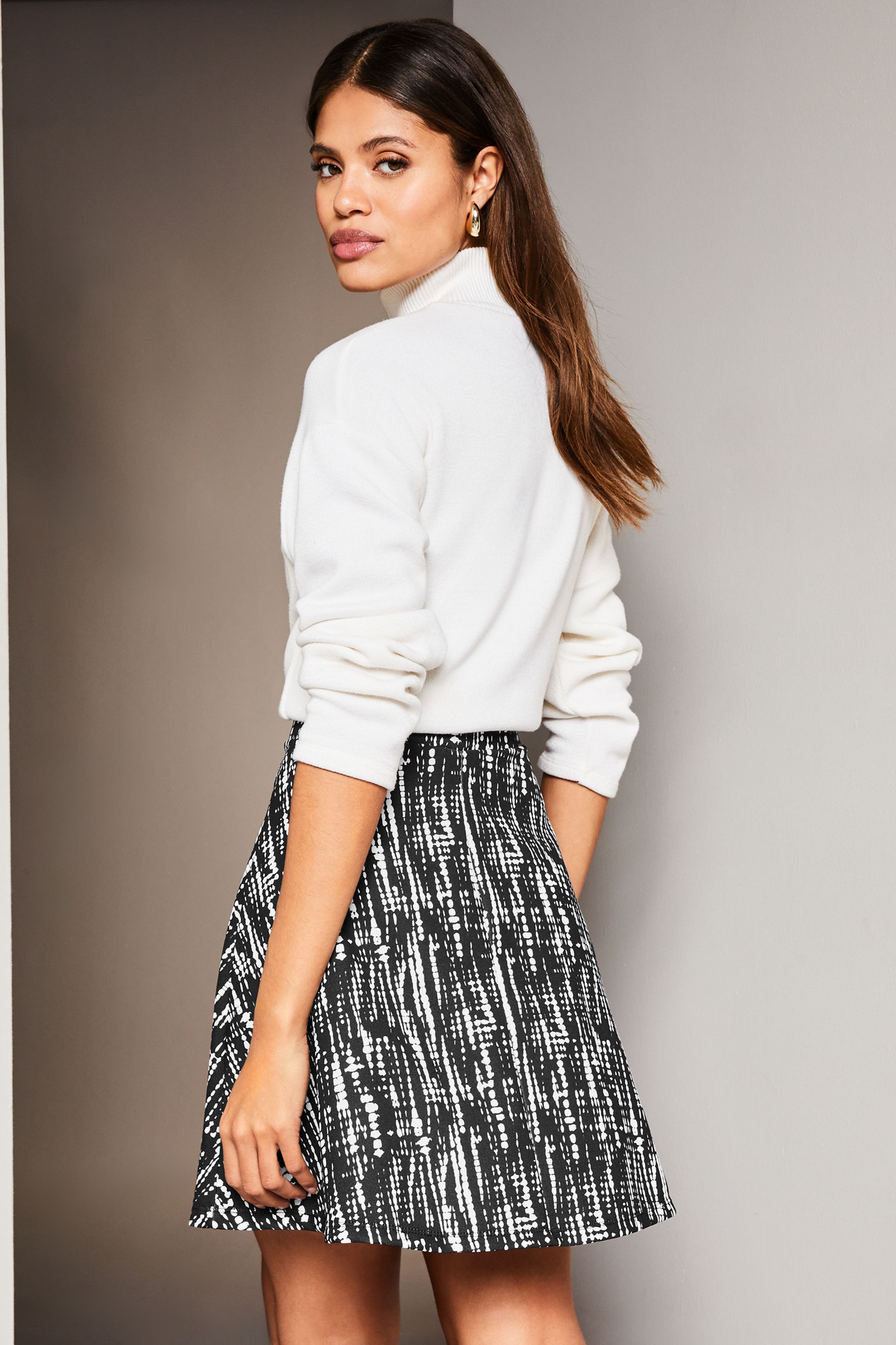 Buy Lipsy Black Marker Print Flippy Mini Skater Skirt from the