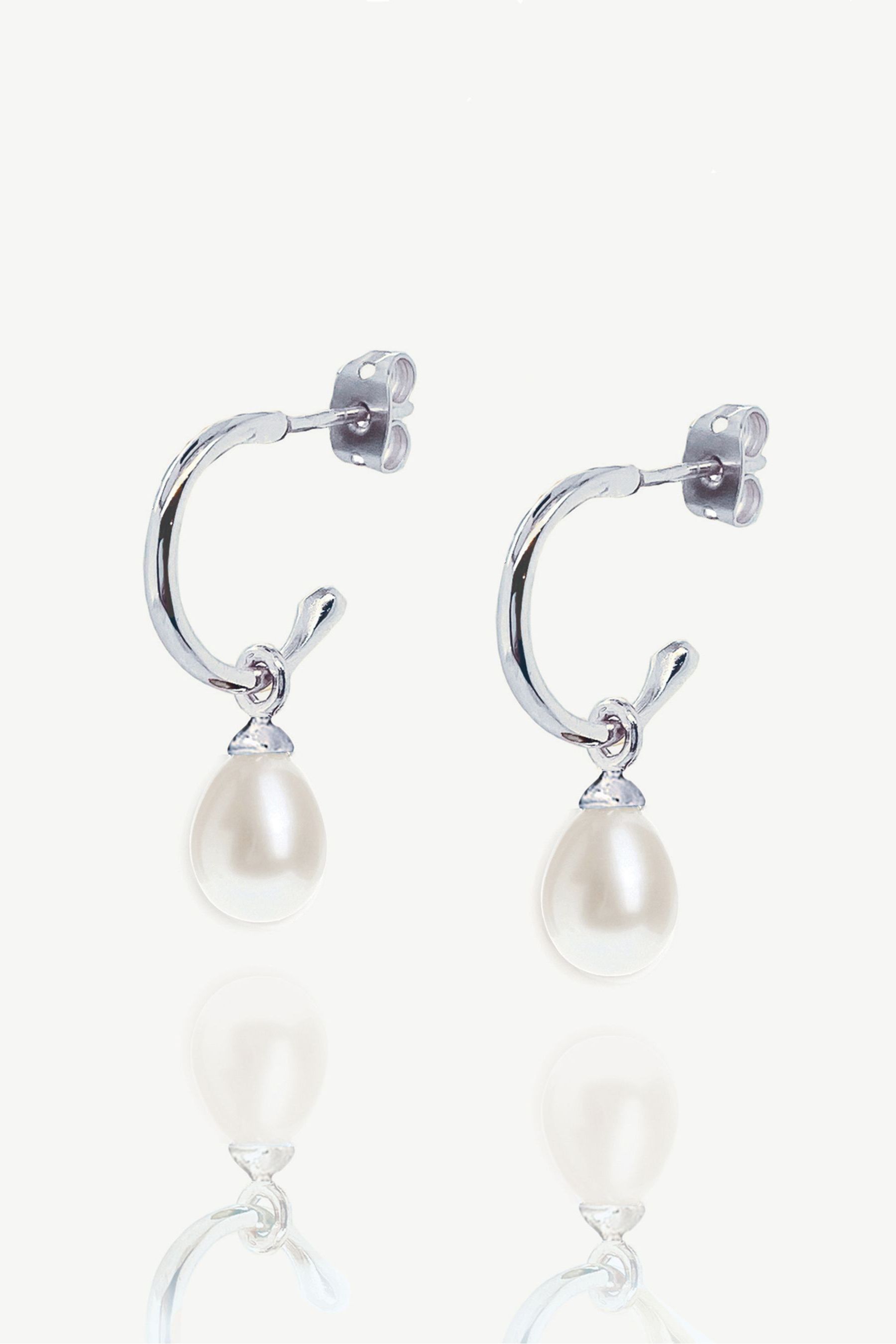 Buy Ivory Co Silver Harrow Modern Pearl Hoop Earrings from the Next UK online shop