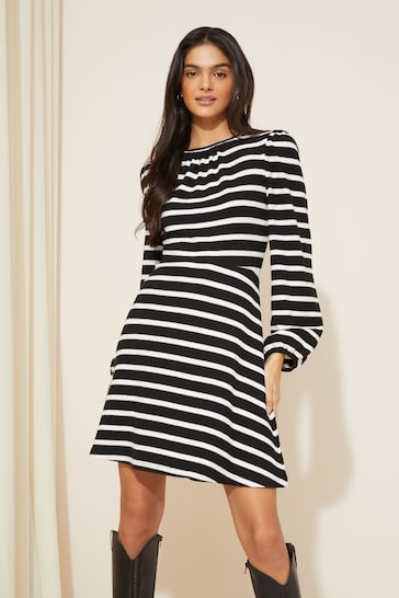 Friends Like These Black Stripe Knit Soft Touch Ruched Long Sleeve Mini Dress