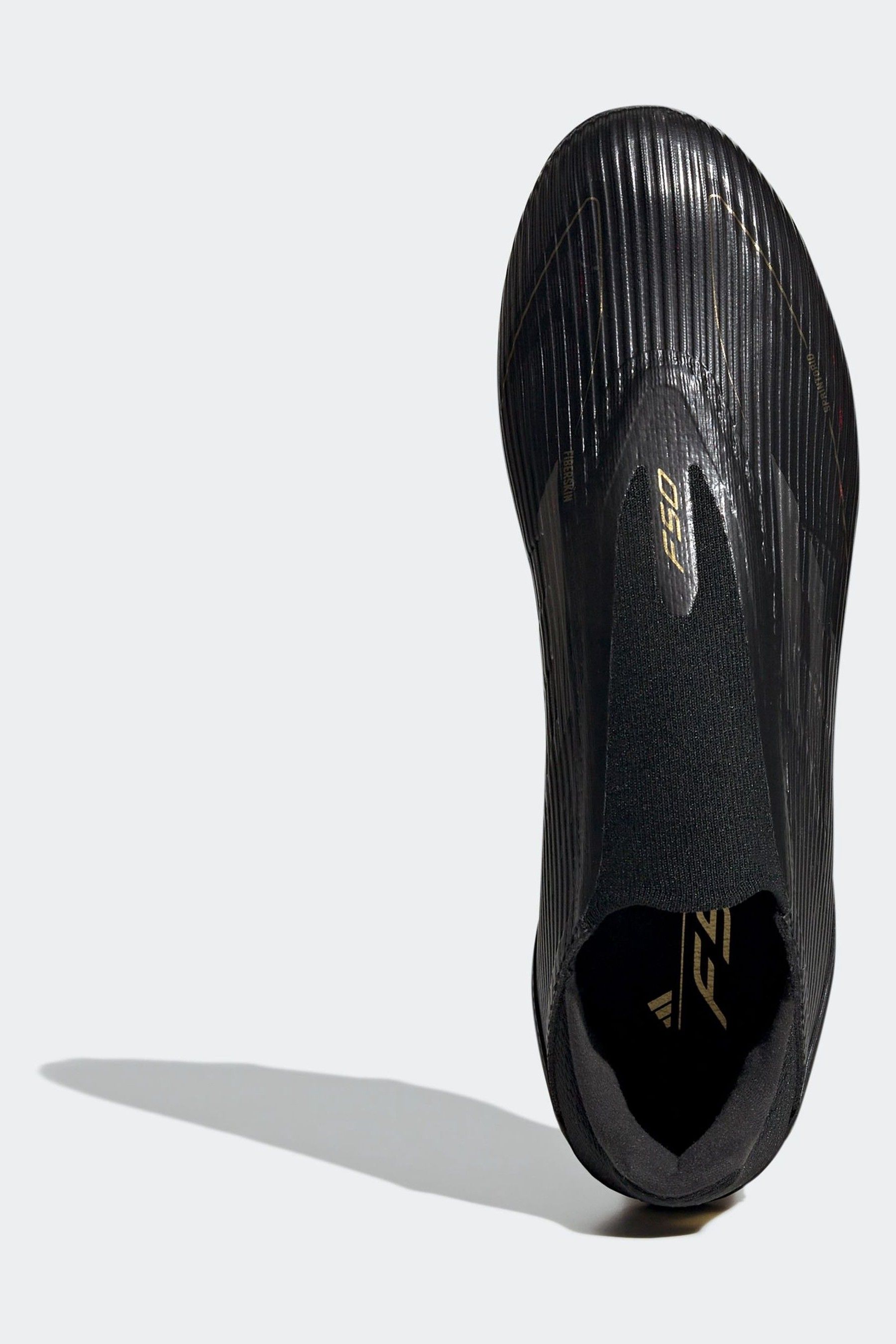 Black and gold laceless football boots store