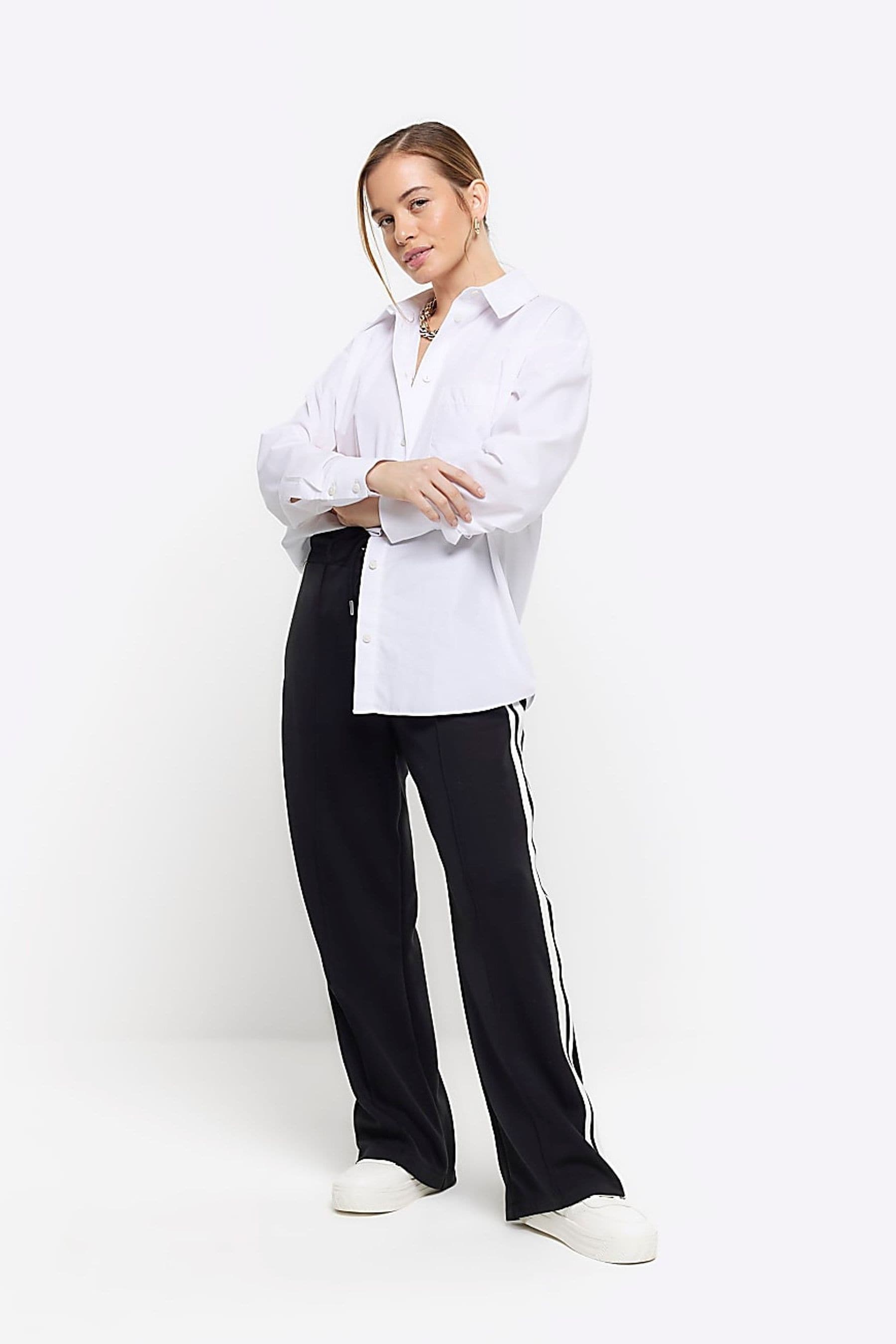 Buy River Island Black Petite Wide Leg Side Stripe Joggers from