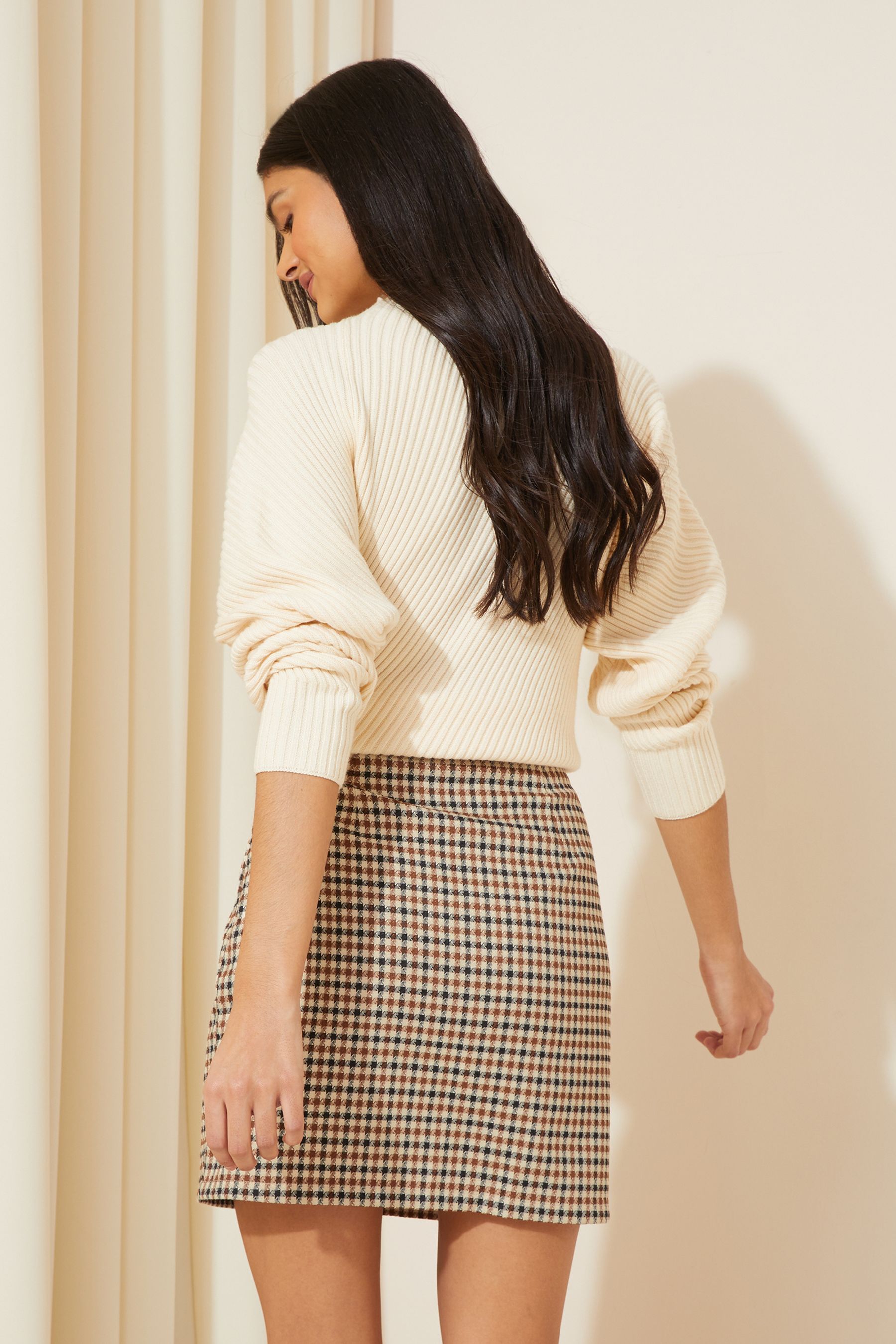 Button clearance check skirt