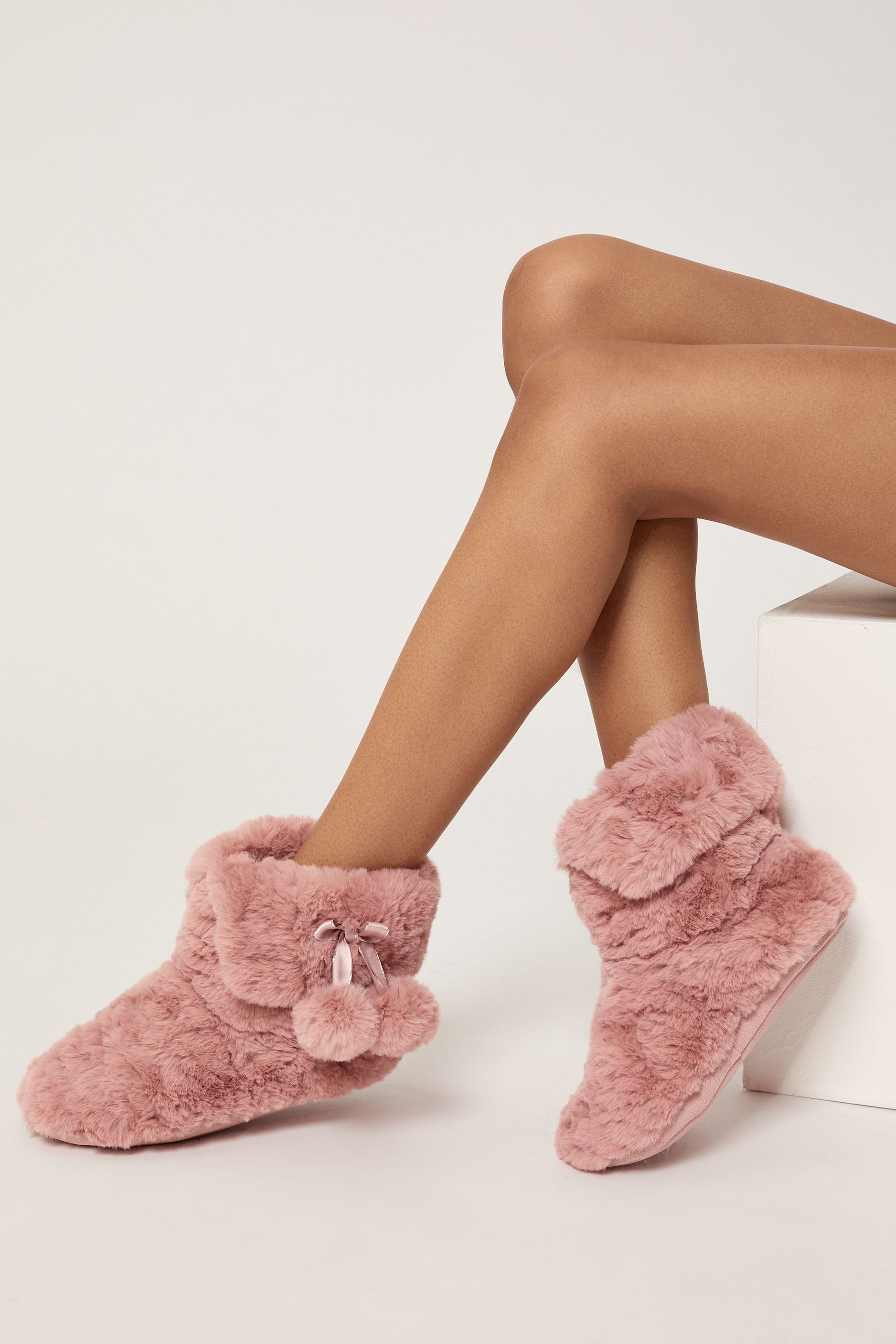 Buy Lipsy Nude Faux Fur Pom Bootie Slippers from the Next UK