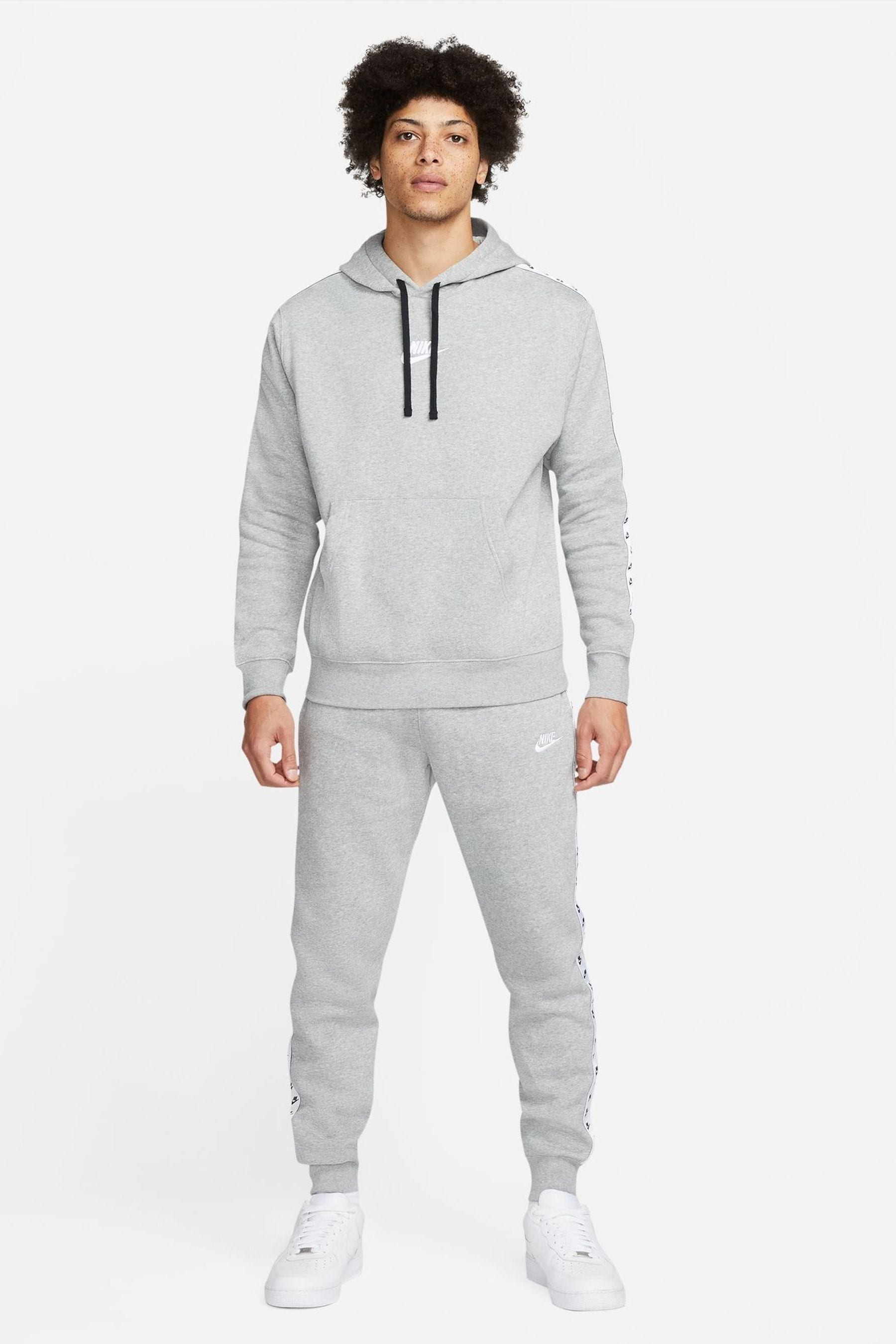Nike grey sales essentials tracksuit